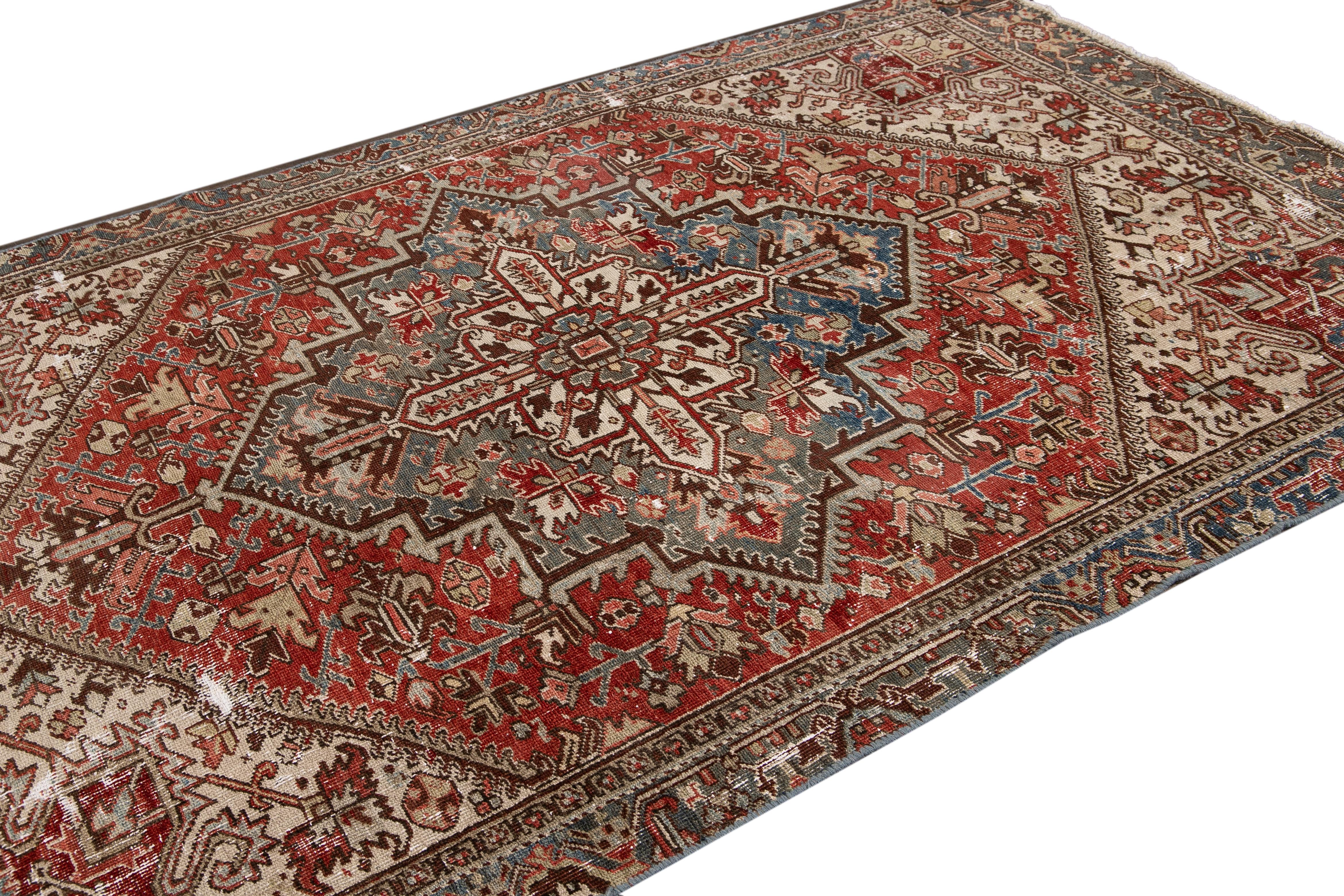 Hand-Knotted Antique Red Heriz Handmade Medallion Floral Wool Rug For Sale