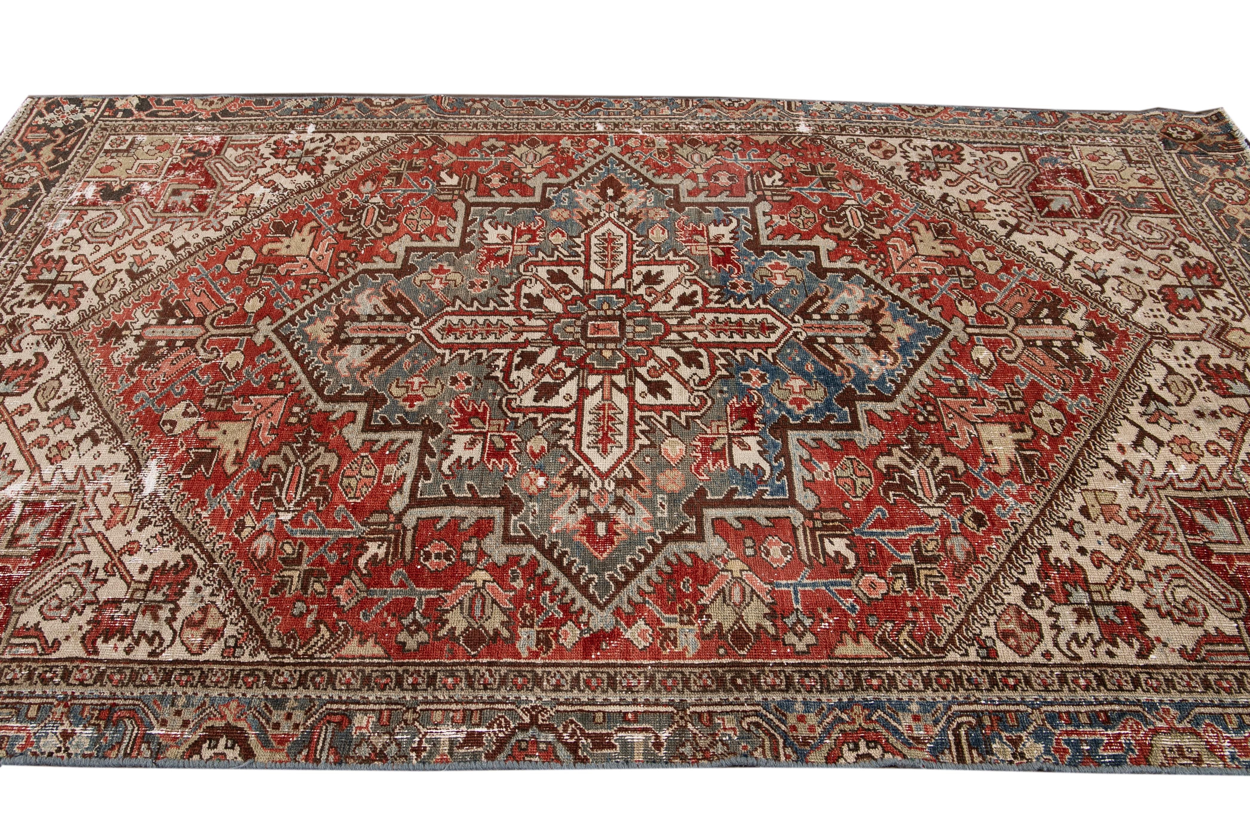 Antique Red Heriz Handmade Medallion Floral Wool Rug In Distressed Condition For Sale In Norwalk, CT