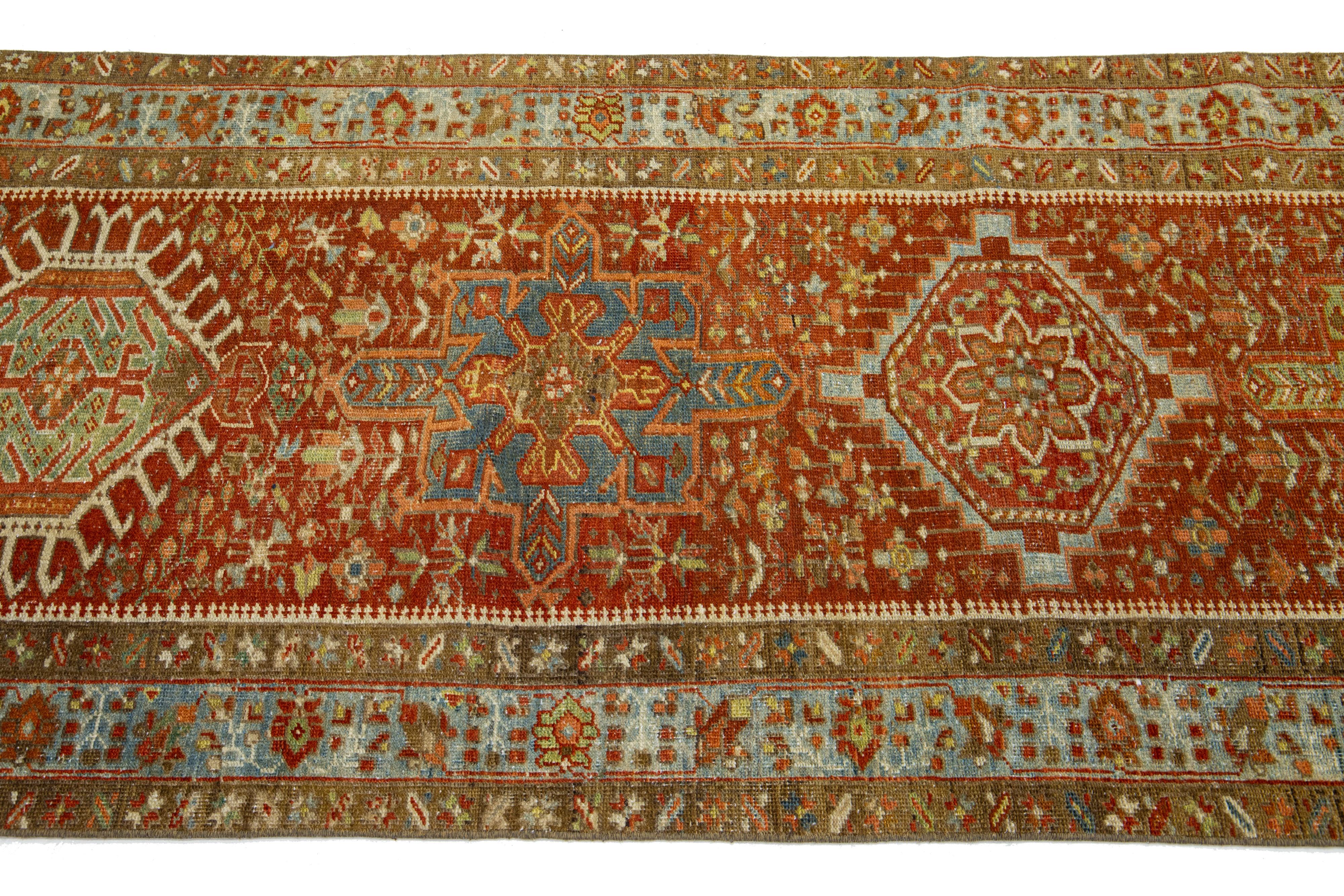 Persian Antique Red Heriz Wool Runner Handmade with Geometric Motif For Sale