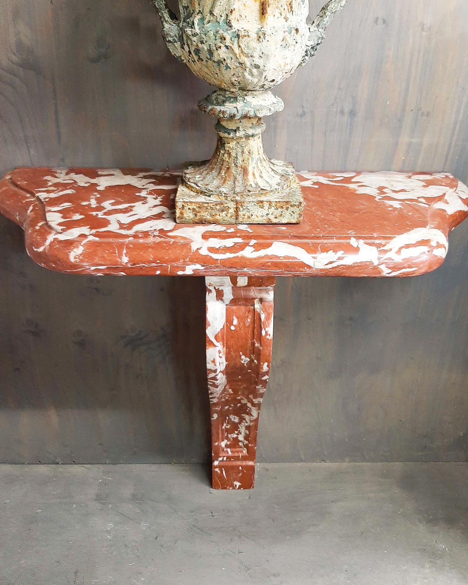 red marble side table