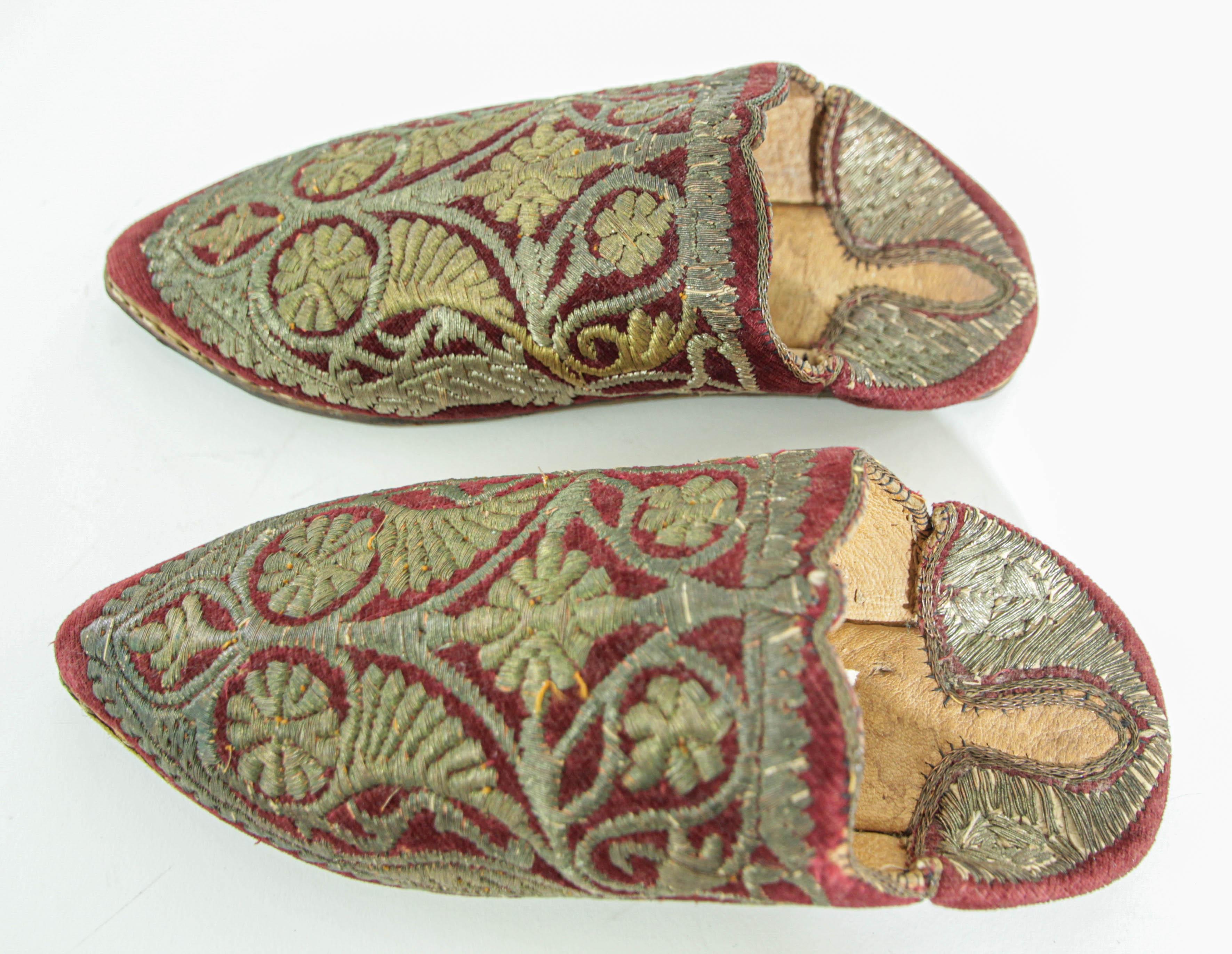 Antique Red Moroccan Embroidered Leather and Velvet Slippers Shoes Circa 1900s.
Antique late 19th century Moroccan Islamic gold thread embroidered lady's shoes
This pair of vintage Morocco ladies mules with cherbil metal embroidery red leather