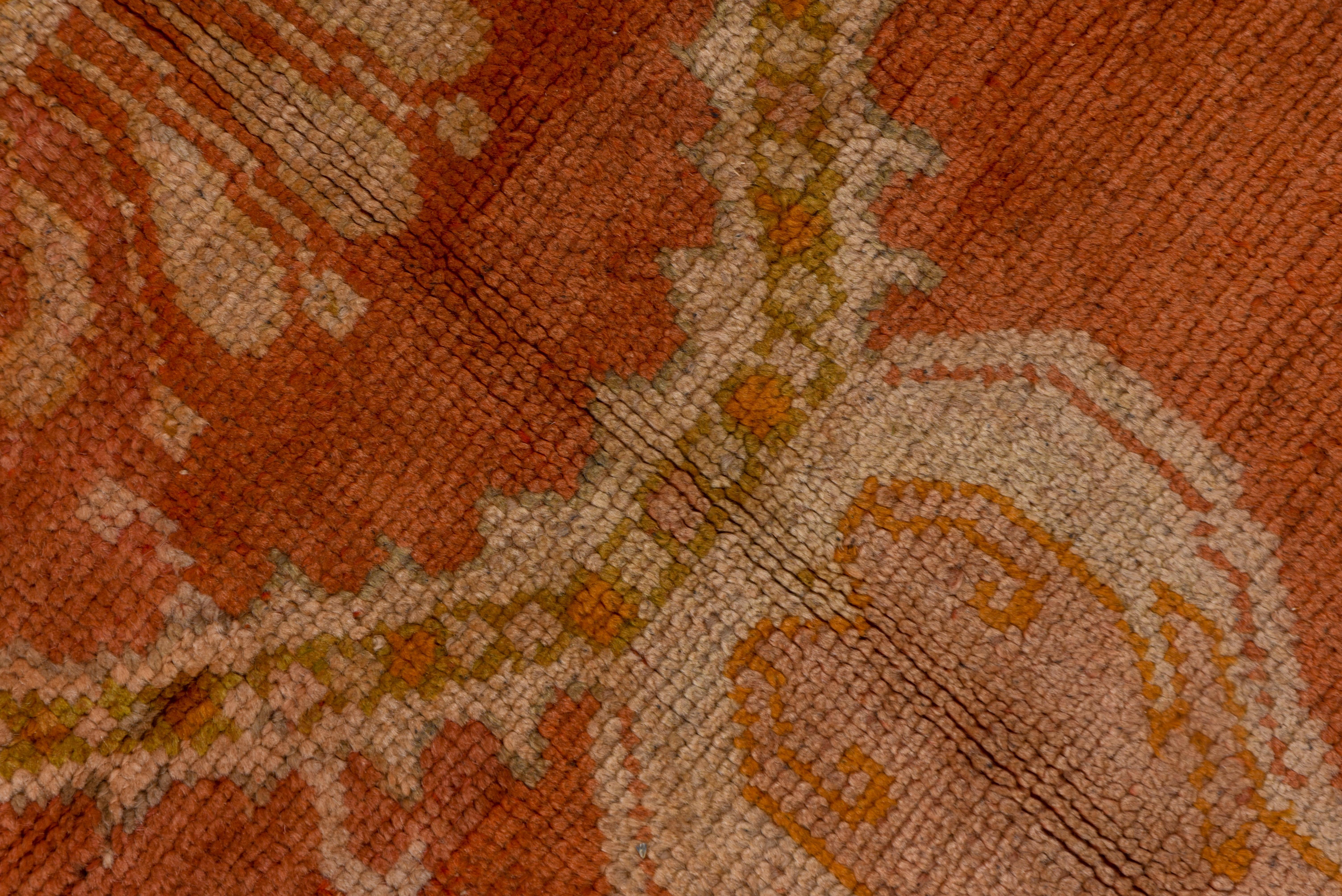 Grand tapis rouge ancien d'Oushak, vers les années 1910 en vente 1