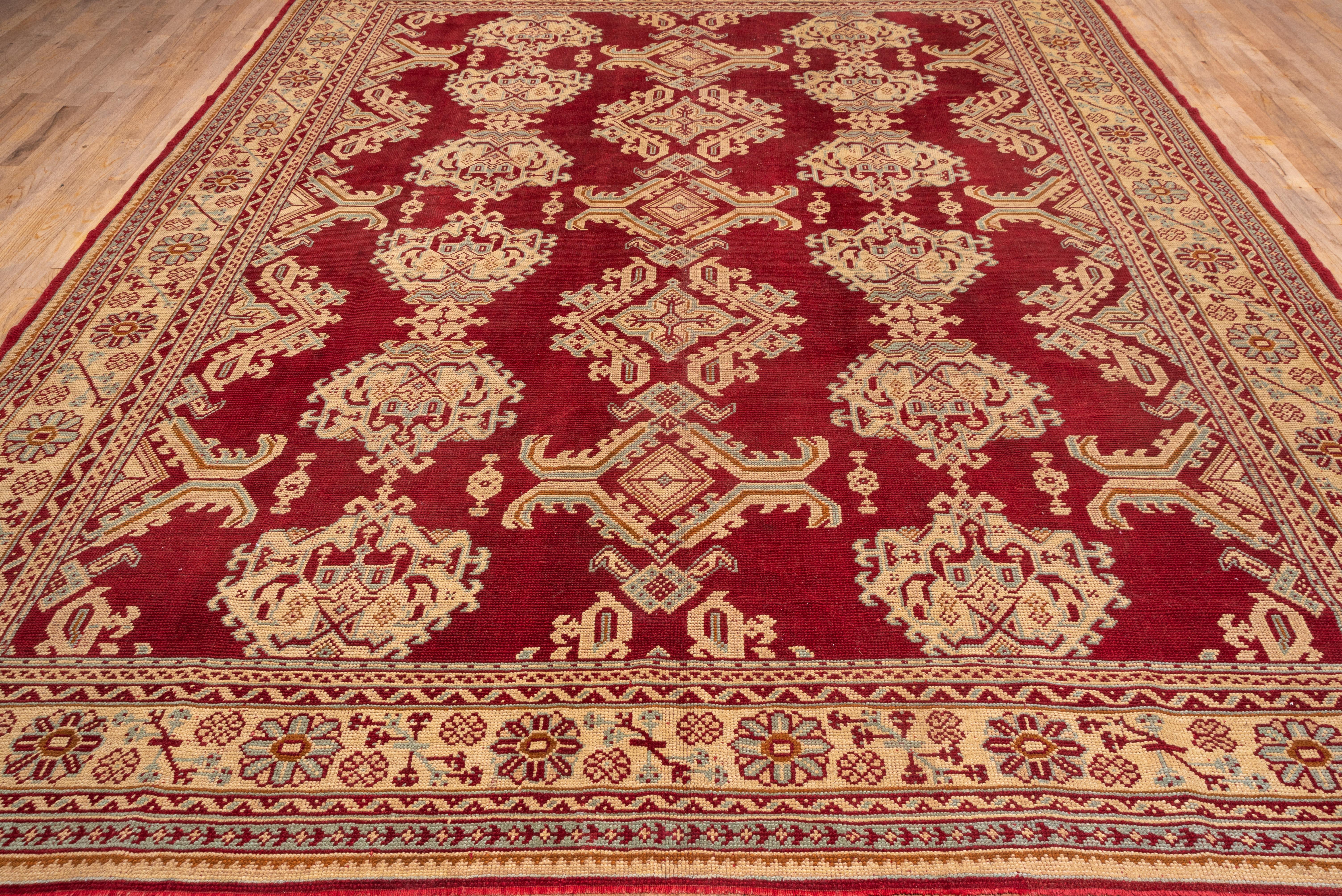 Turkish Antique Red Oushak Rug, Gold Borders, All-Over Field with Leaf Pattern For Sale