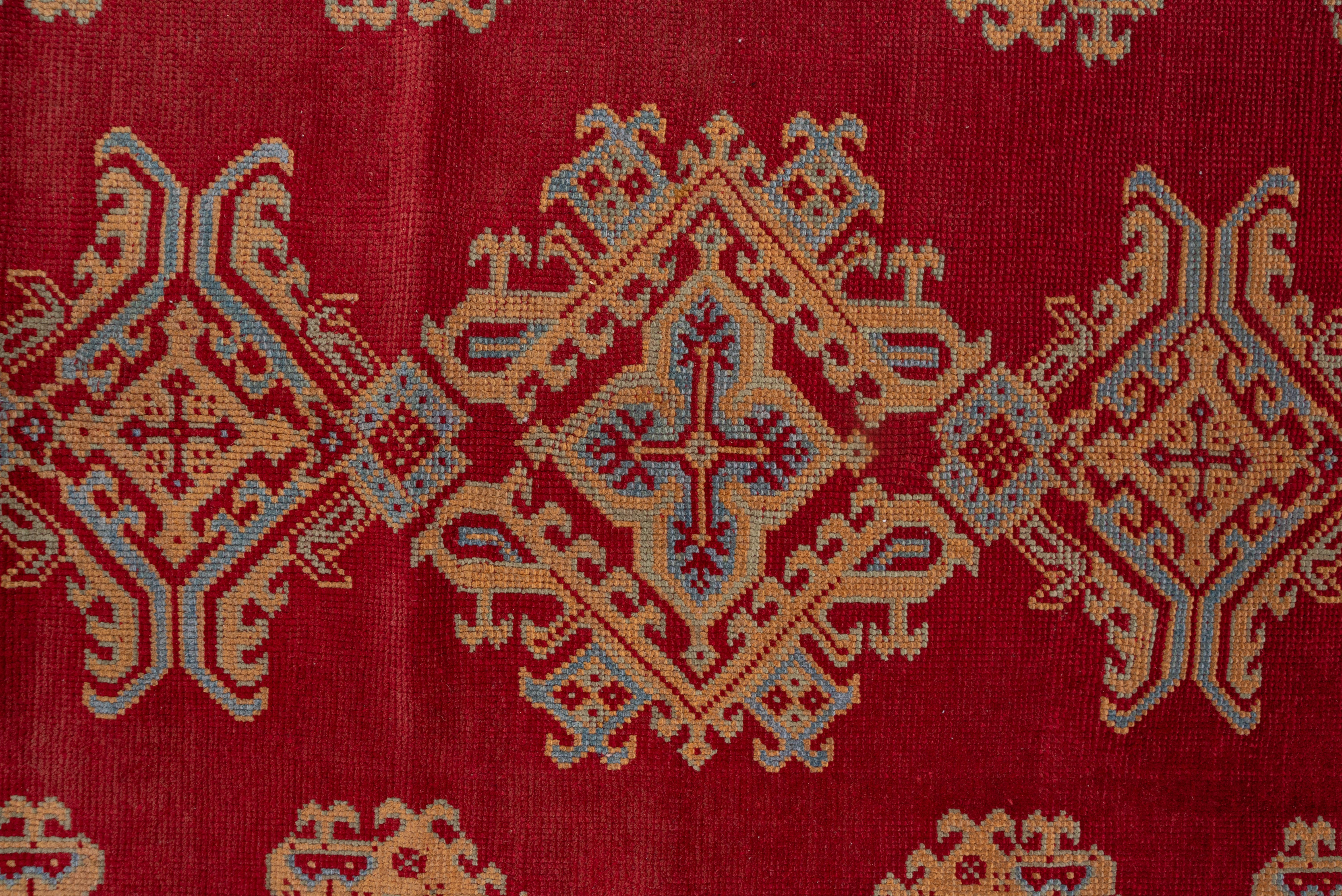 Hand-Knotted Antique Red Oushak Rug with Orange & Blue Borders, Circa 1920s For Sale