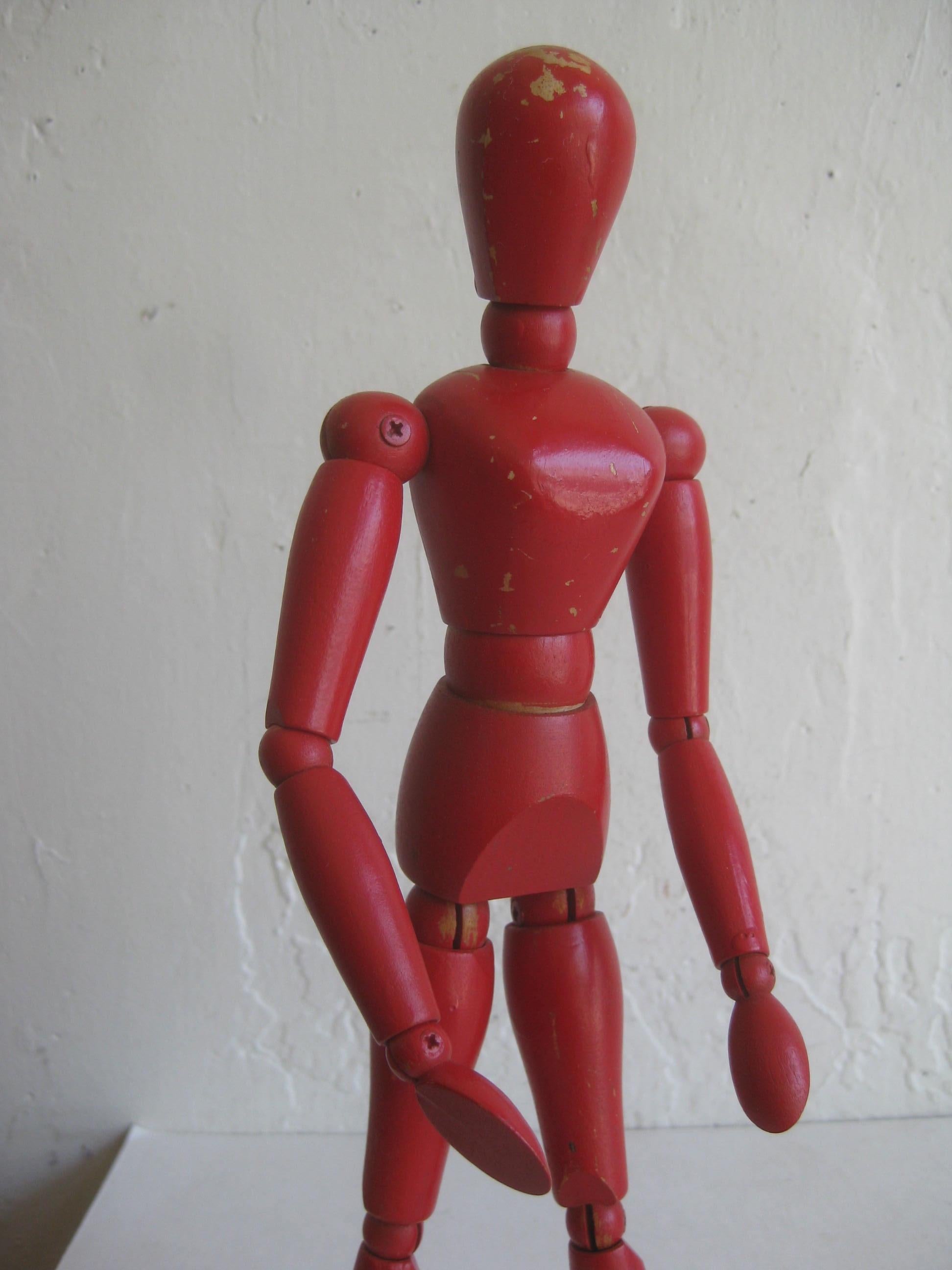 High quality antique articulated wood artist nude figural model sculpture dating from the 1940s-1950s. The model is a tough to find version with the original red enamel paint. In very nice shape and can be posed many different ways. Some paint loss