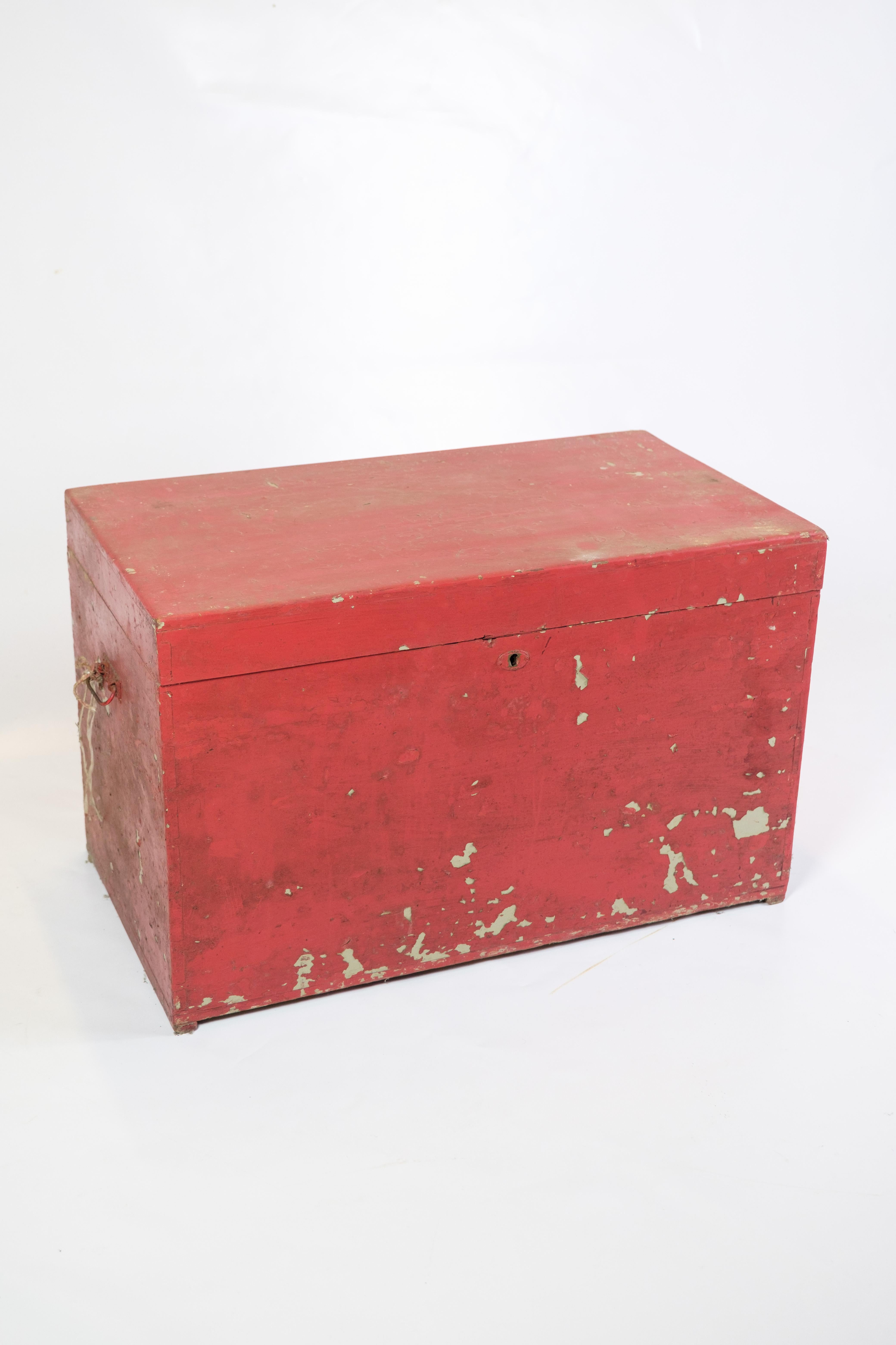 This antique red painted chest from 1830 exudes authenticity and charm. The patinated surface and artisanal construction testify to its historical value. With spacious storage and a rustic aesthetic, this chest is a beautiful addition to any room,