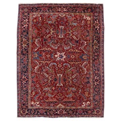 Tapis persan rouge antique Heriz en laine à motifs floraux fait à la main