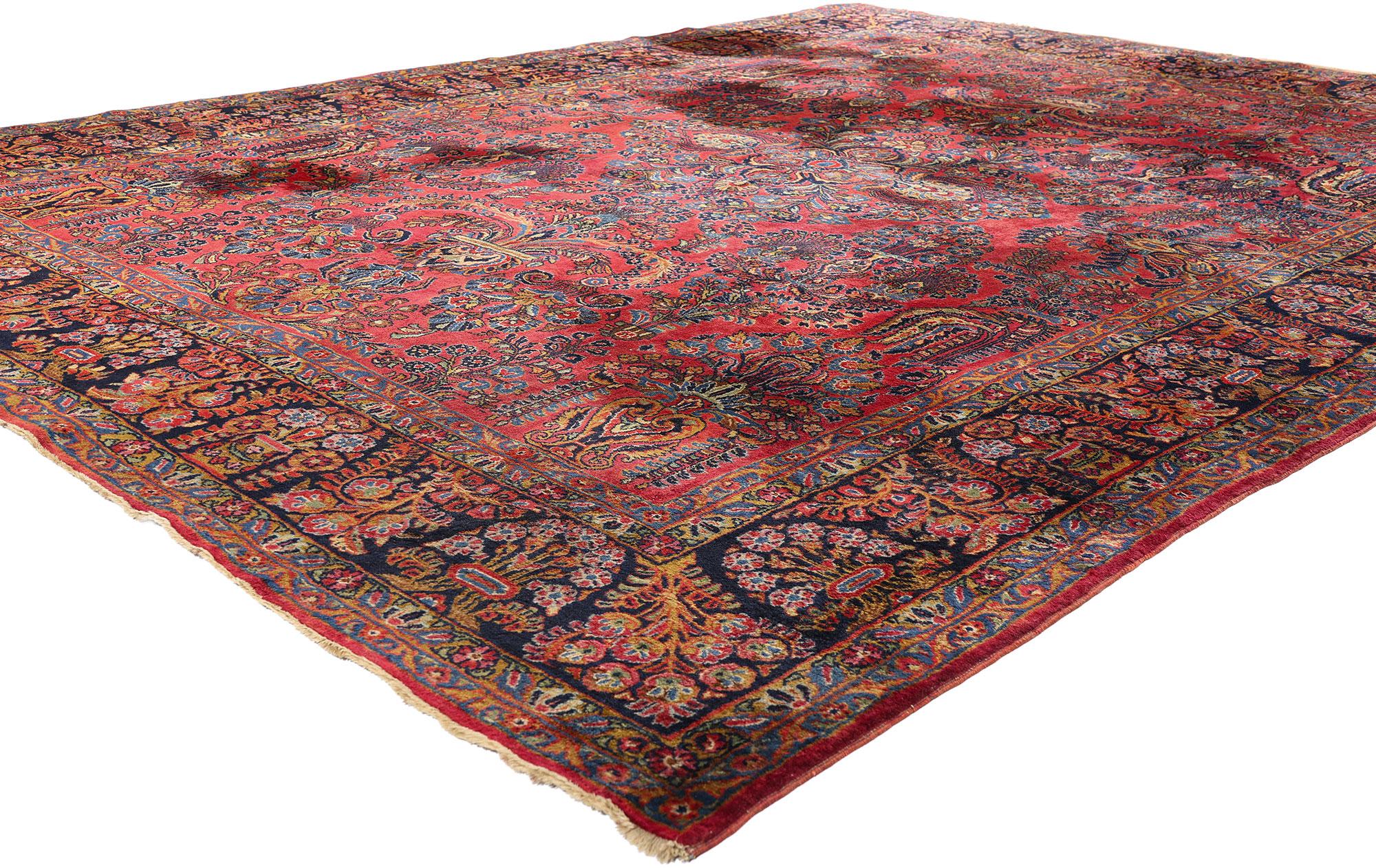 79225 Antique Red Persian Sarouk Rug, 08'09 x 11'06. Woven in the twilight of the Early 20th Century, this hand-knotted Persian Sarouk rug is a masterpiece of enduring elegance, encapsulating the artisanship and heritage of a golden age in Persian
