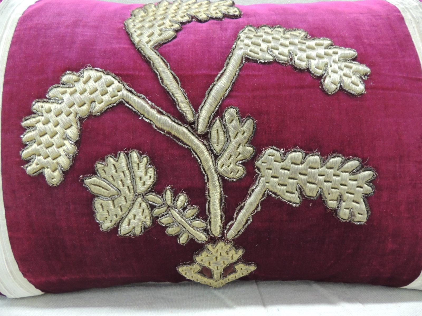 Antique red silk velvet applique bolster decorative pillow.
18th century metallic threads Persian embroidery applied onto silk velvet
to create this one-of-the-kind bolster pillow. 18th century floral silk velvet backing, embellished
with 19th