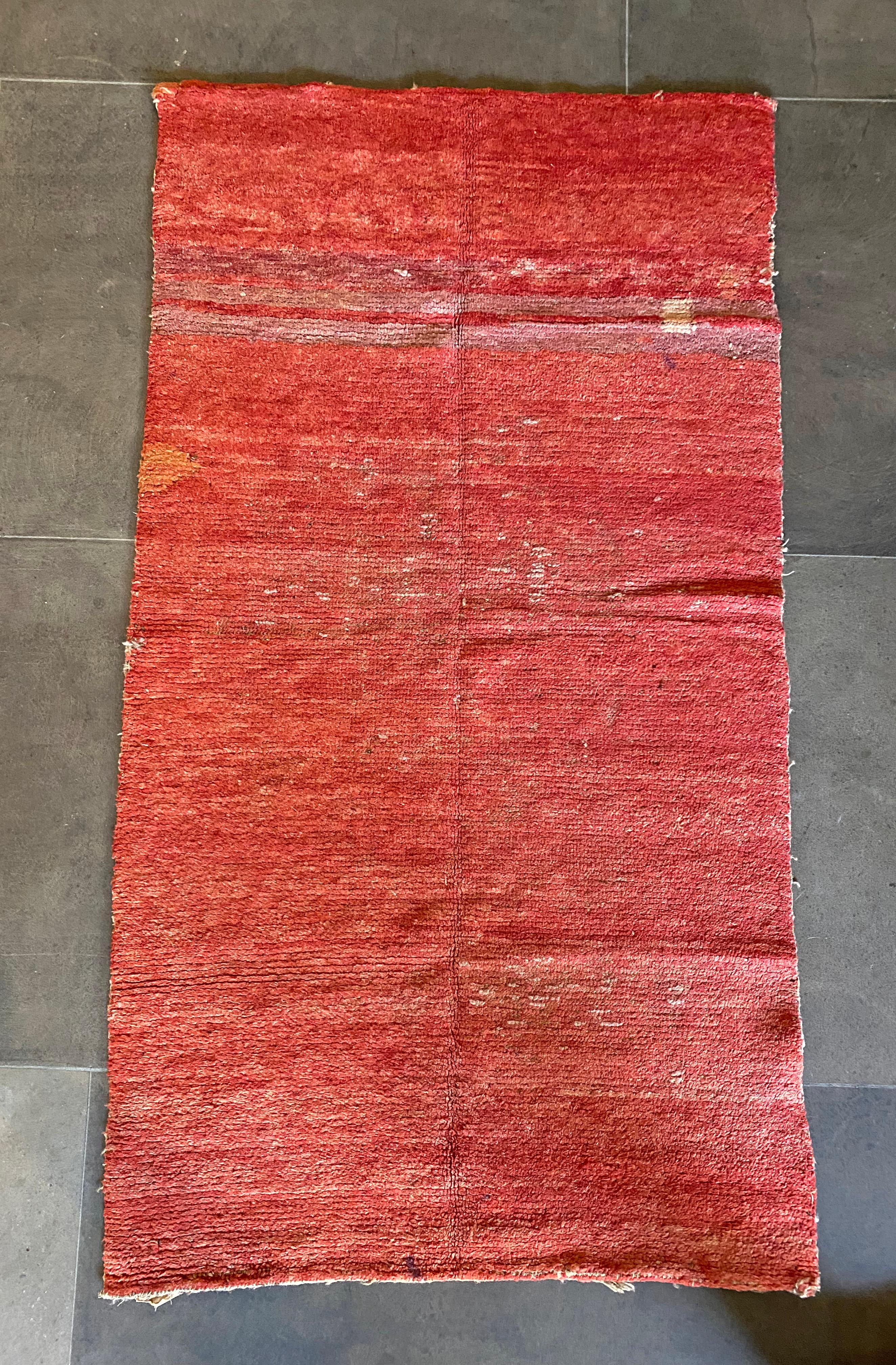 This rug from the early part of the 20th century is made from naturally dyed wool from the highlands of Tibet. Wangden is the name of the valley in Tibet where these rugs originate from. Wangden is known for this type of carpet weaving which is