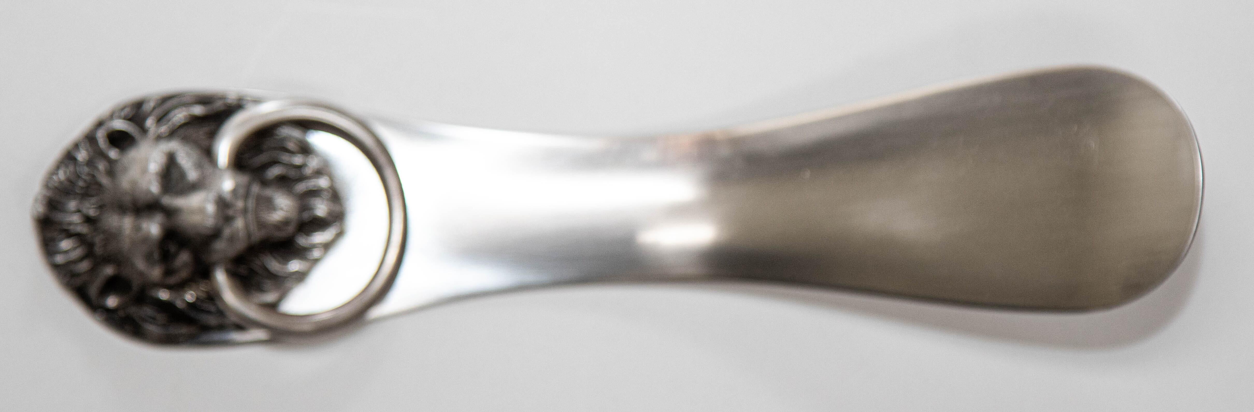 Antique 1950s Reed & Barton Silver Plated Shoe Horn with Lion head and Ring Handle.
Beautiful Reed & Barton heavy Lion head with ring in his mouth.
This cool shoe horn by Reed and Barton is finely made in polished silver plate featuring a lion mask