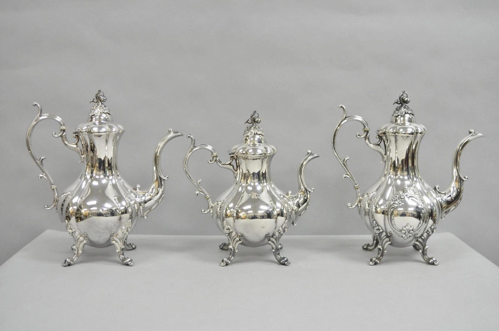 Antique Reed & Barton Winthrop Silver Plated Tea Set with Webster Wilcox Serving Tray - 6 Piece Set. Set includes (1) Webster Wilcox oval serving tray, (1) Reed & Barton Winthrop coffee pot, (1) Reed & Barton Winthrop lidded sugar bowl, (1) Reed &