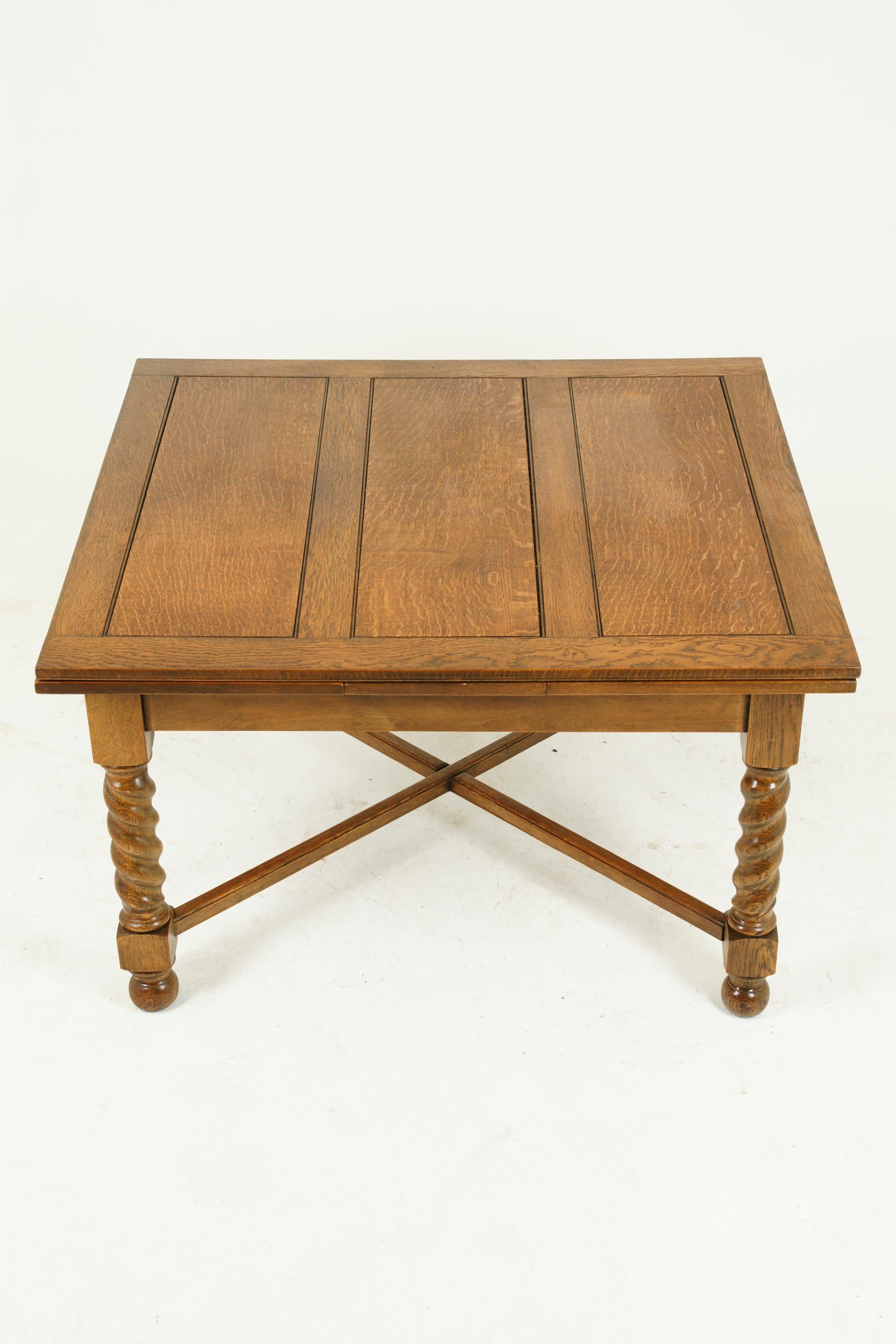 Antique refectory table, antique dining table, draw leaf table, barley twist, Scotland, 1920

Scotland 1920
Solid oak construction
Golden oak finish
Paneled top with pair of paneled leaves underneath
Leaves can be pulled out to extend table to