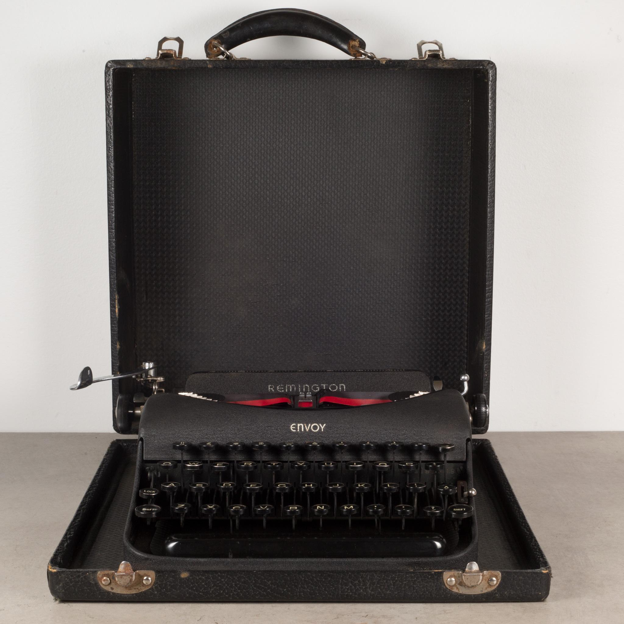 ABOUT

A refurbished Remington Envoy typewriter in black crinkle finish with original case. The keys are white letters on a black background. This typewriter is very clean and has been refurbished. It has smooth typing and the carriage advances