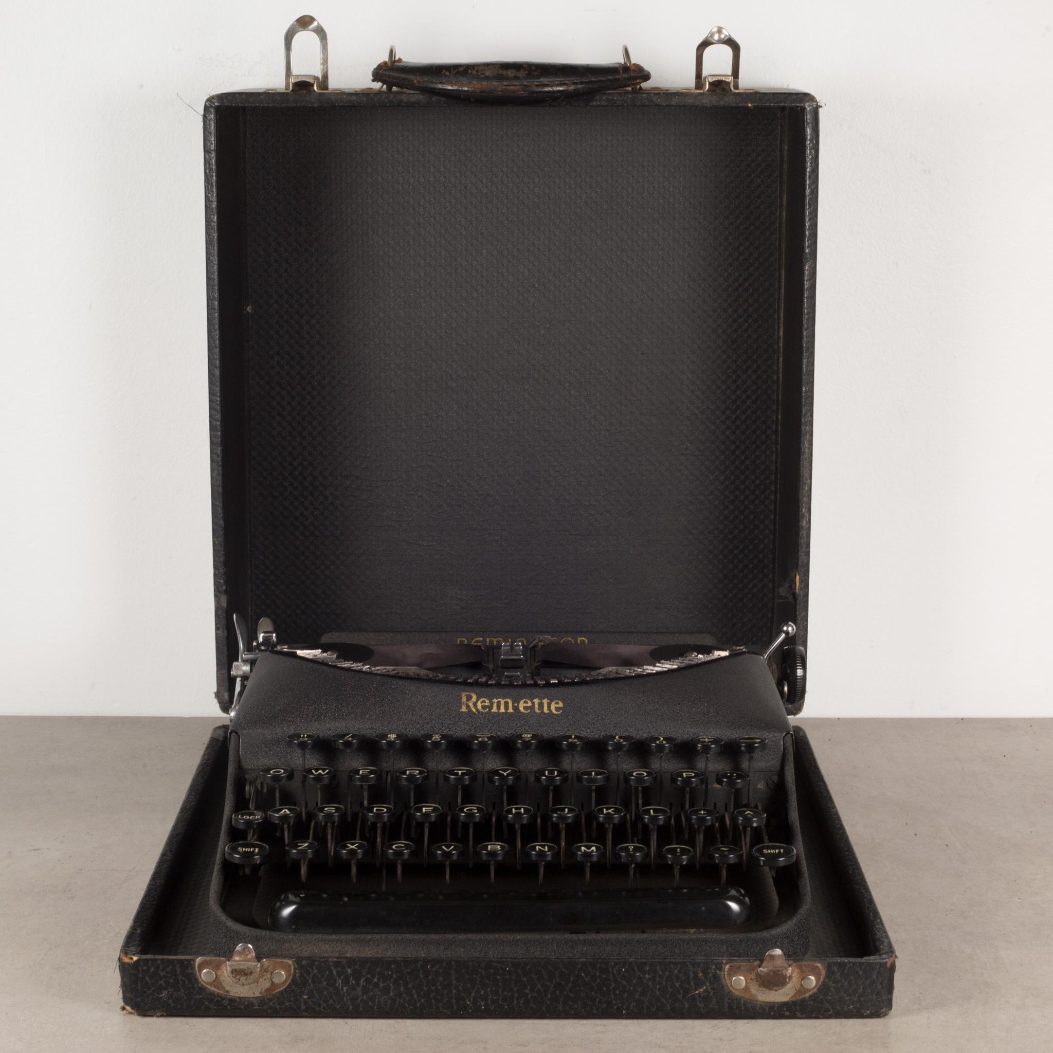 ABOUT

An original refurbished Remington Remette typewriter in black crinkle finish with original case. This typewriter is very clean and in good working order. It has smooth typing and the carriage advances and functions very well. The case is