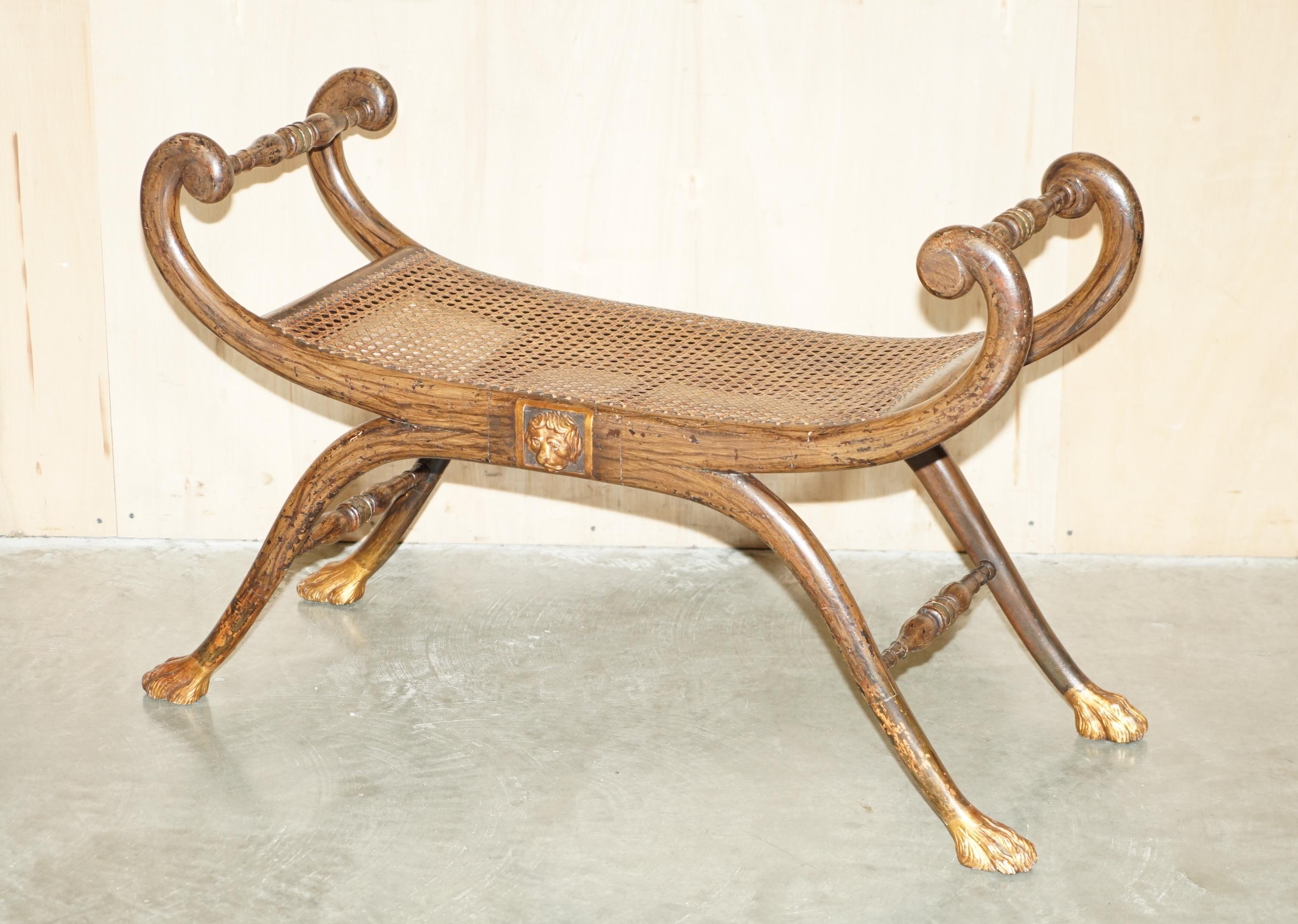 Royal House Antiques

Royal House Antiques is delighted to offer for sale this stunning original circa 1810-1820 Regency Grained simulated Rosewood painted Ebonized Parcel Gilt and Caned Window seat

Please note the delivery fee listed is just a