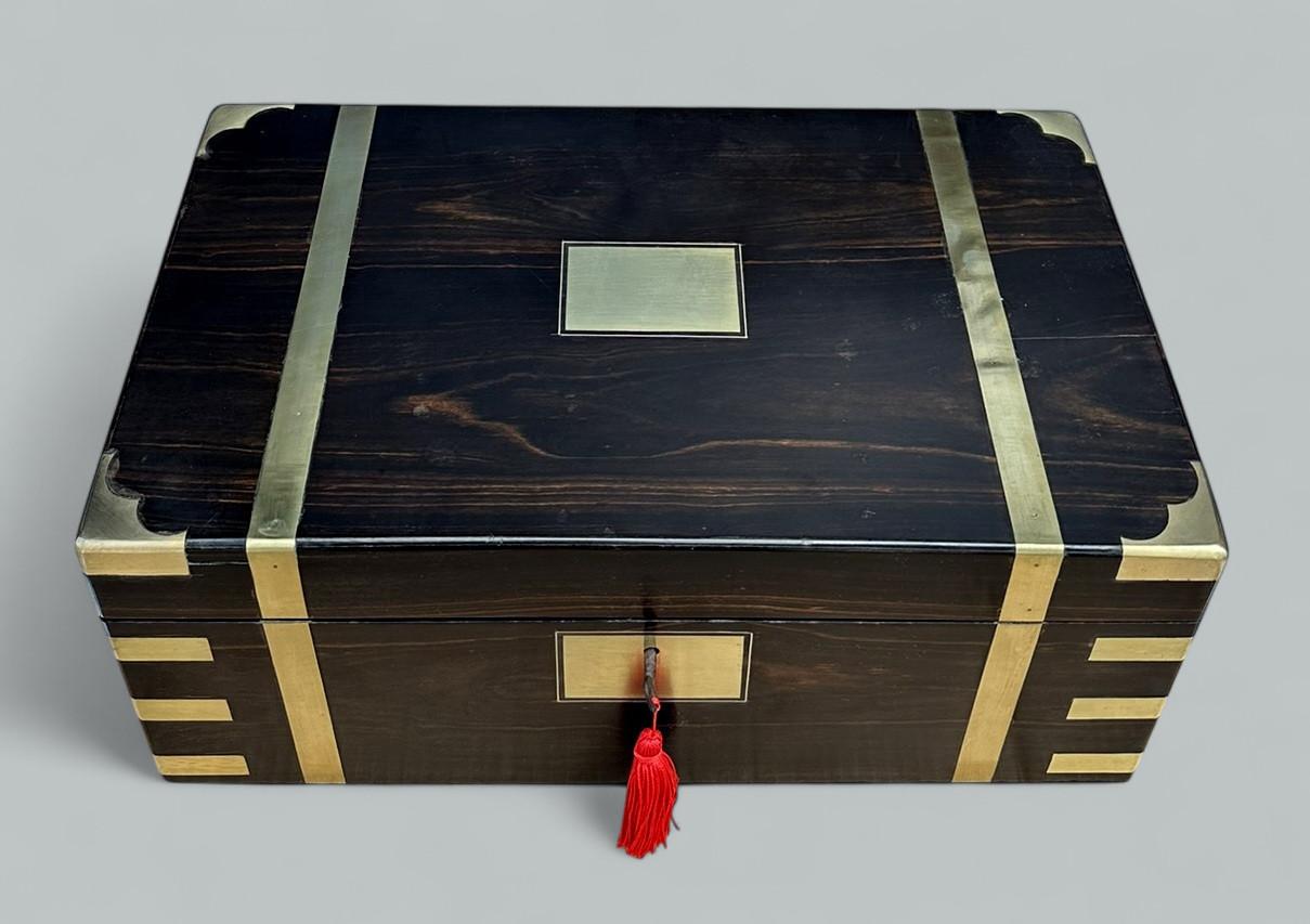 An Exceptionally Fine Quality English Well Figured Solid Coromandel Anglo-Indian Colonial Officers Campaign Style Travelling Writing Slope of outstanding quality and unusually large size. First quarter of the Nineteenth Century. This Slope is an