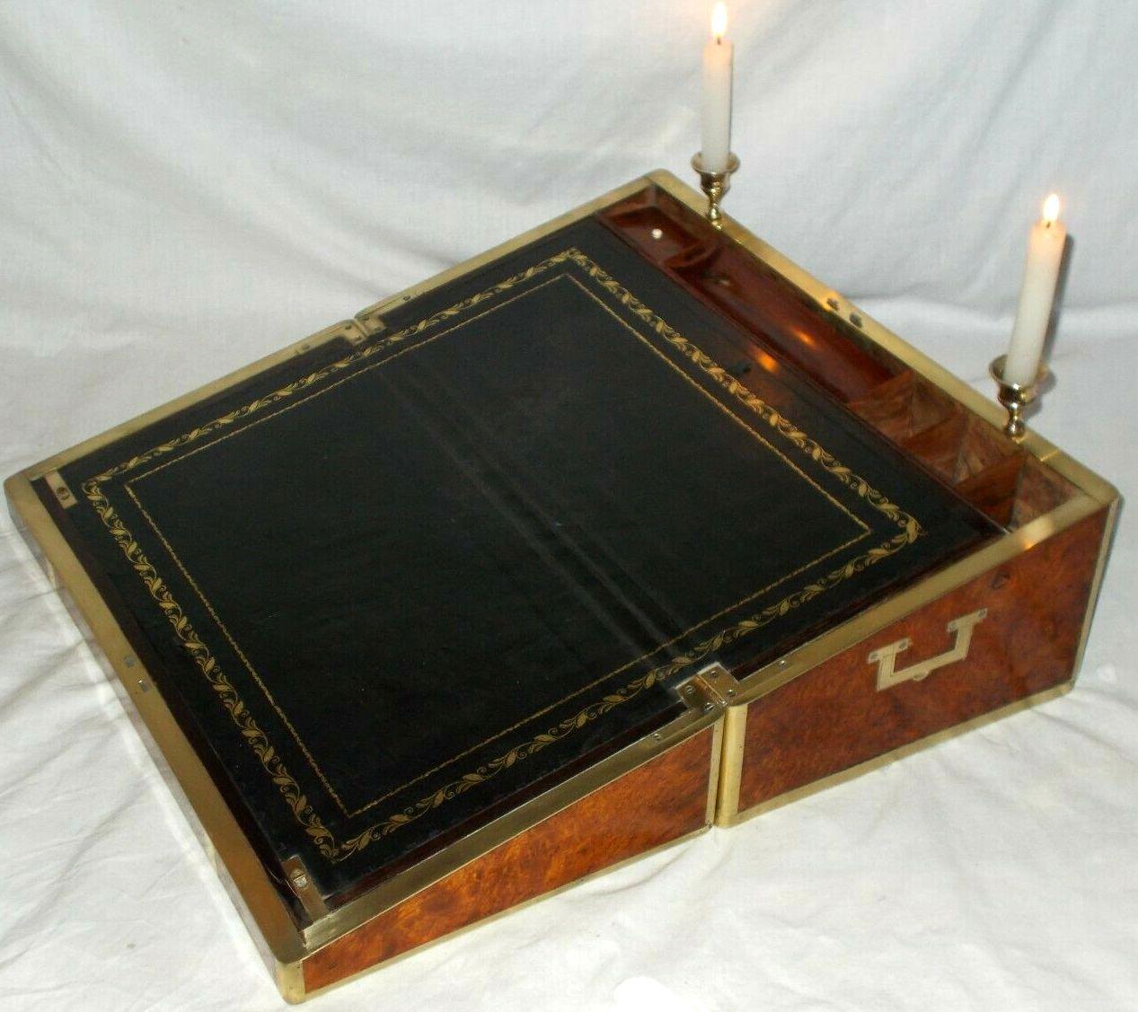 An exceptionally fine quality English well figured solid burr walnut, Amboyna Anglo-Indian Colonial Officers Campaign Style Travelling Writing Slope of outstanding quality and unusually large size. First quarter of the Nineteenth Century. This Slope