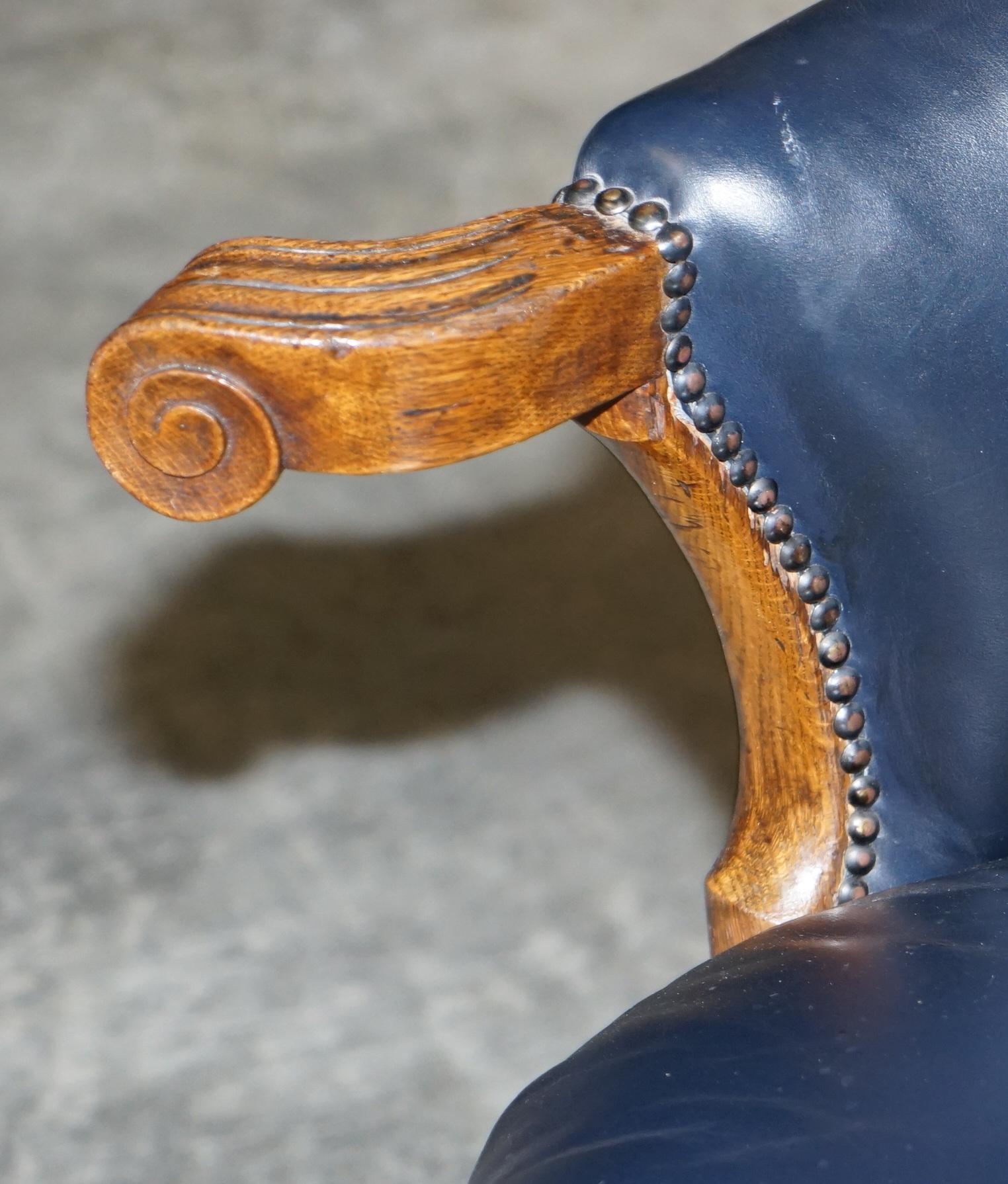 Hand-Crafted Antique Regency circa 1810-1820 Claw & Ball Oak Framed Blue Leather Armchair For Sale