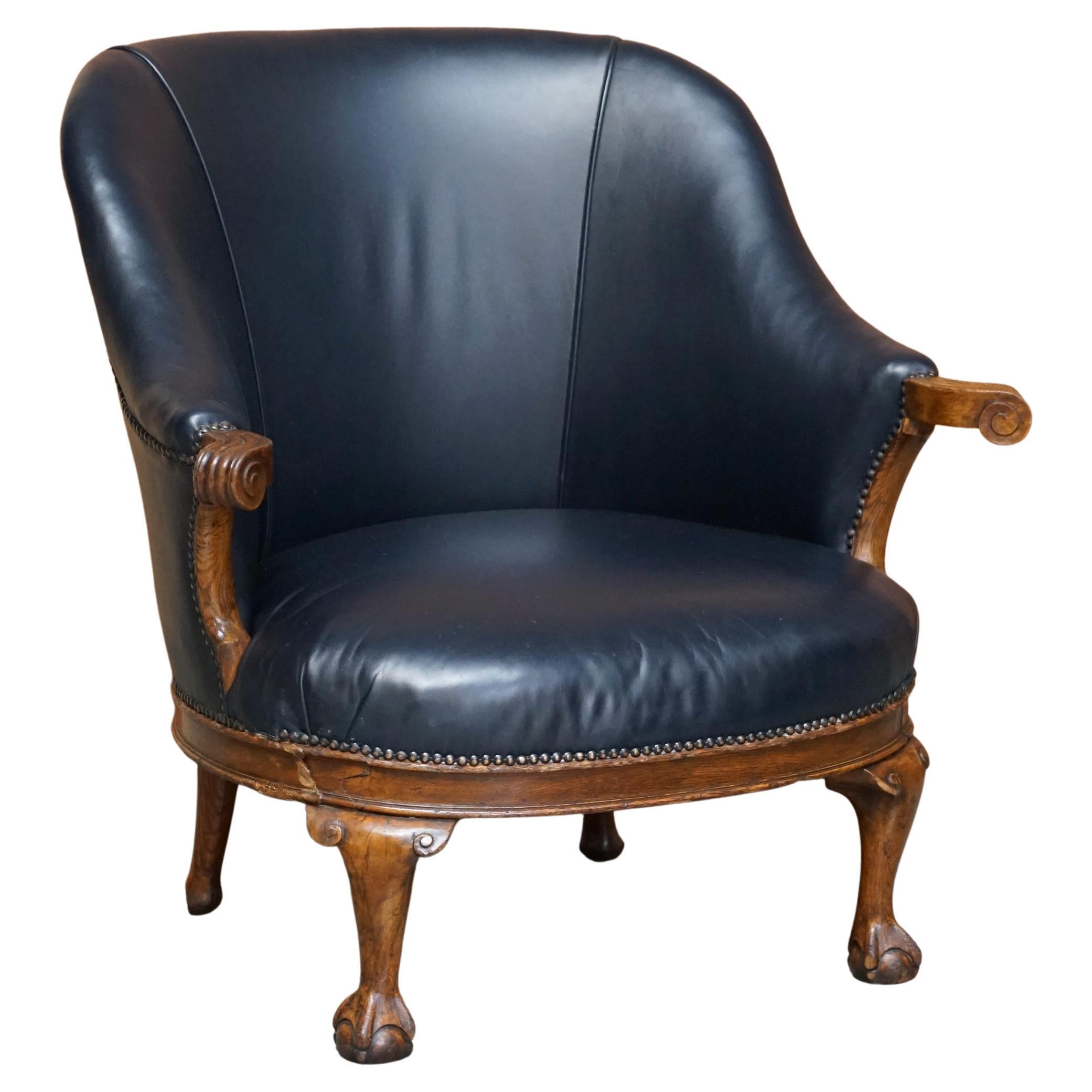 Antiker antiker Regency-Sessel aus blauem Leder mit Klauen- und Kugelrahmen aus Eichenholz, um 1810-1820