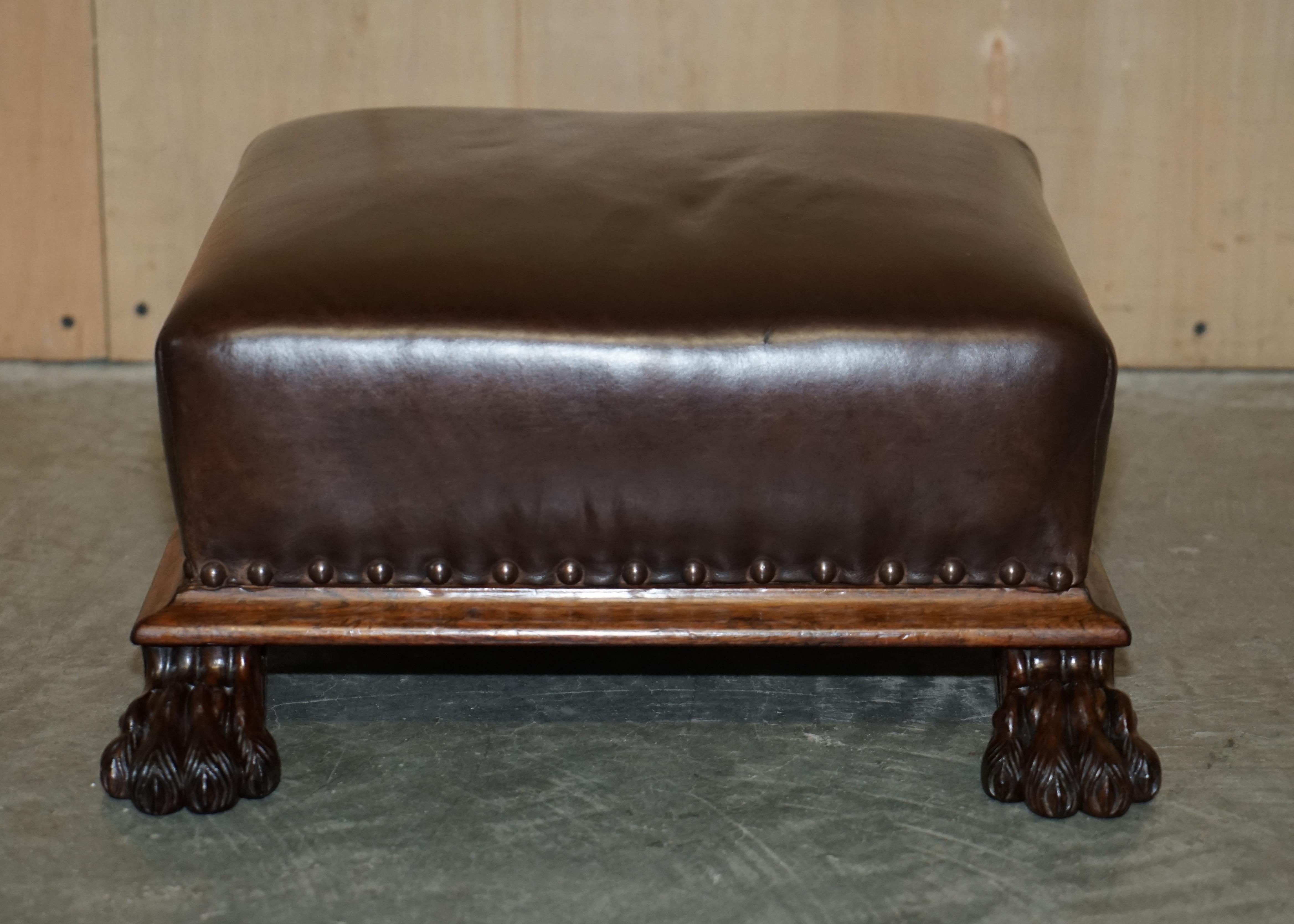 We are delighted to offer for sale this stunning, totally original circa 1810-1820 Regency brown leather with Rosewood frame footstool finished with Lion's hairy paw feet

Please note the delivery fee listed is just a guide, it covers within the