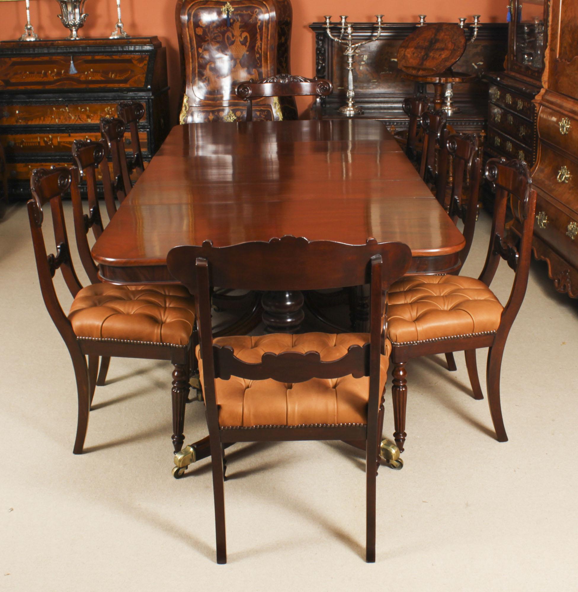 This is a fabulous high quality dining set comprising an antique flame mahogany Regency Period metamorphic triple pillar dining table and a set of ten Regency dining chairs, all circa 1820 in date.

The fabulous high quality antique flame mahogany
