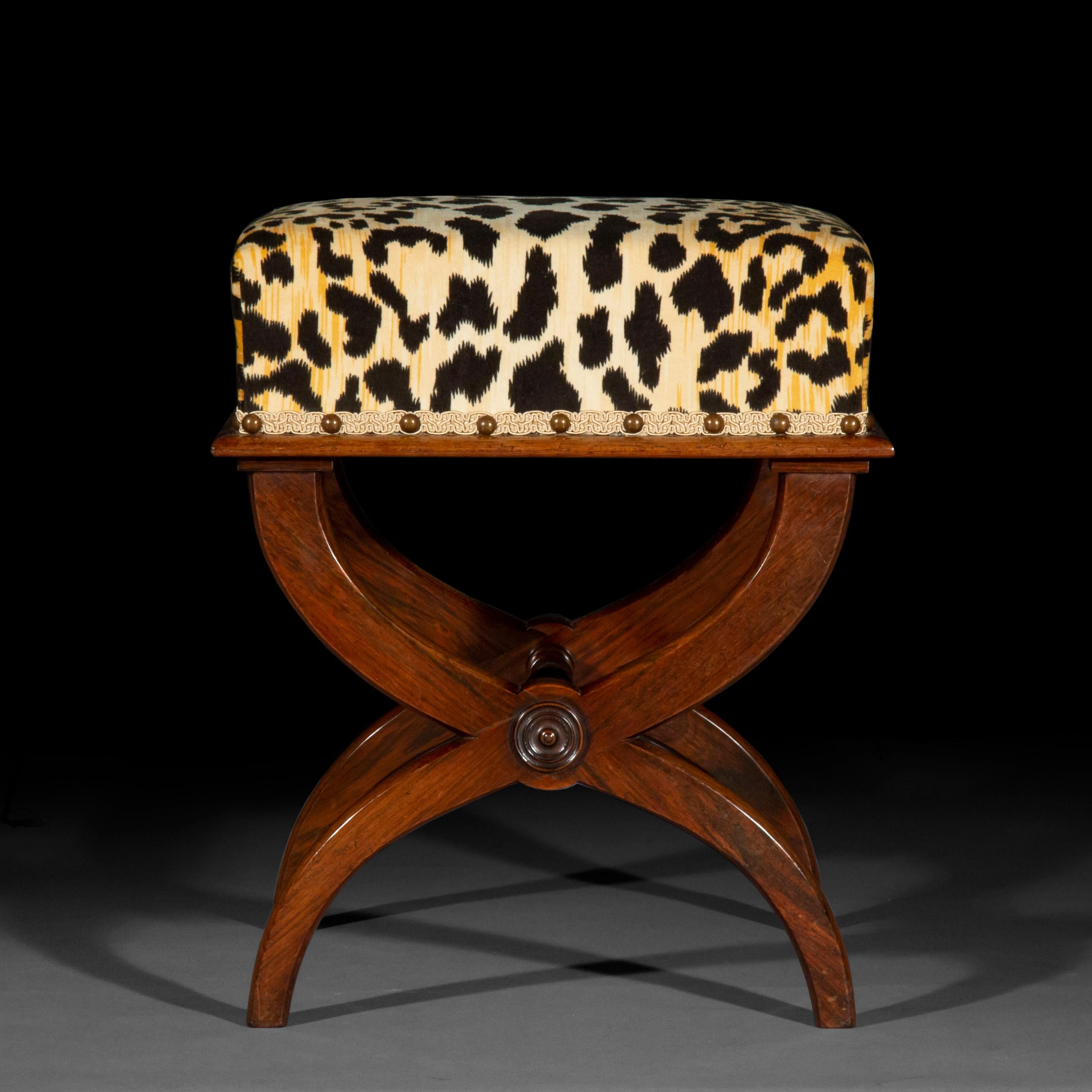 An elegant early 19th century Curule stool of compact proportions.

Why we like it
Its pure form and neat proportions make this elegant stool a rare example of its kind.

Sella Curulis, the chair of state, is derived by the ancient writers from