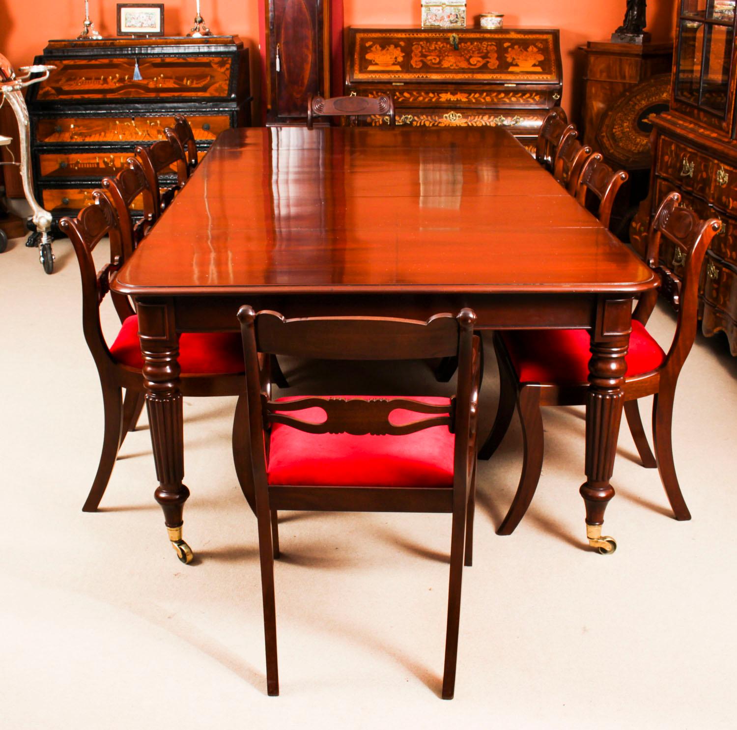 A very rare opportunity to own a fabulous dining set comprising an antique Regency dining table, and a set of ten antique Regency dining chairs, Circa 1820 in date.

The table is made of beautiful solid flame mahogany. This can be seen in the