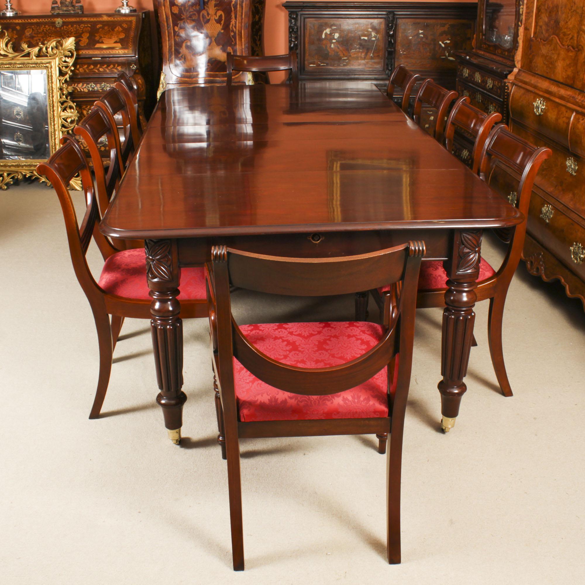 A very rare opportunity to own a fabulous dining set comprising an antique Regency dining table in the manner of Gillows, Circa 1820 in date, and a set of ten Vintage Regency Revival dining chairs.

The table is made of beautiful solid flame