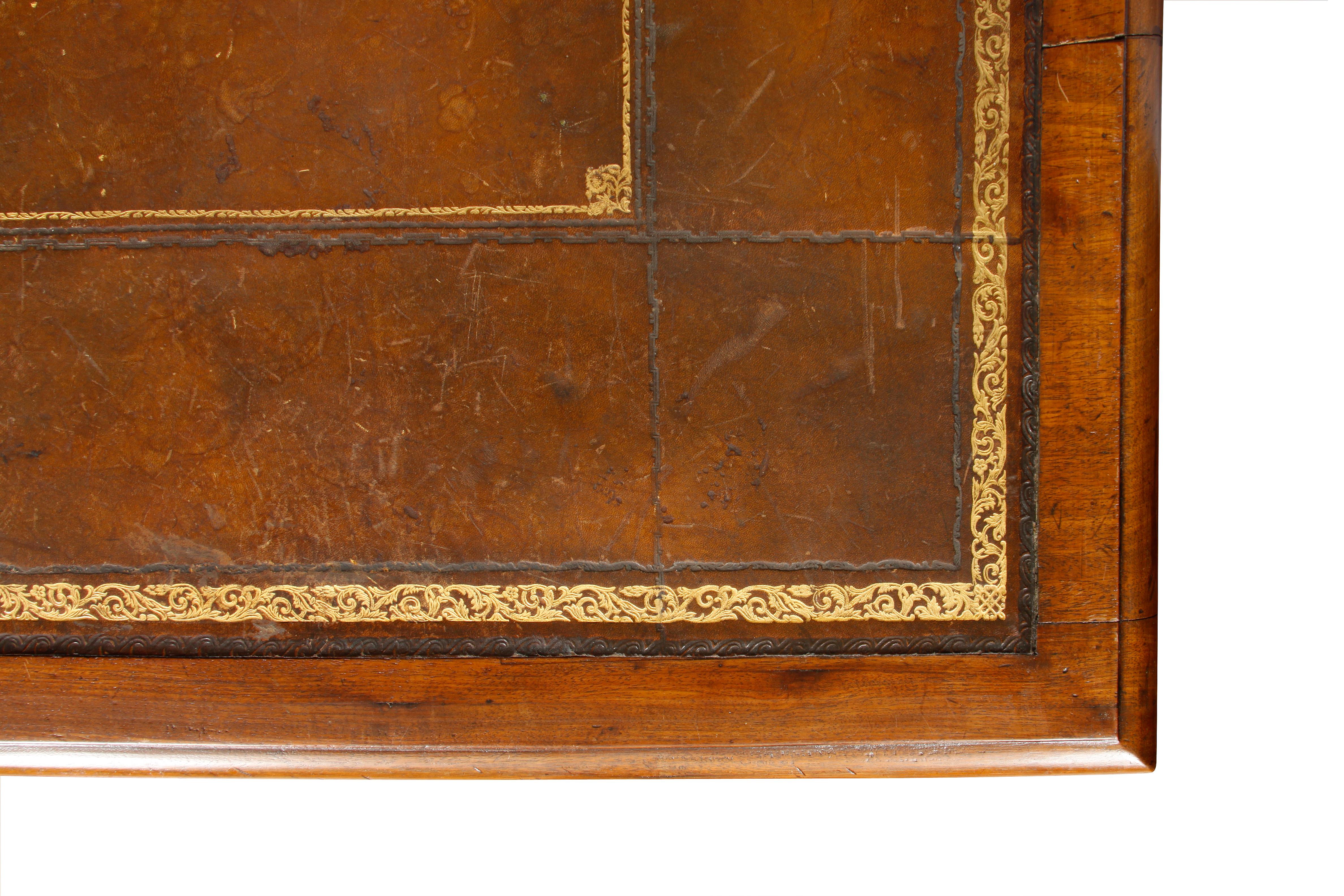 Antique regency leather top desk.