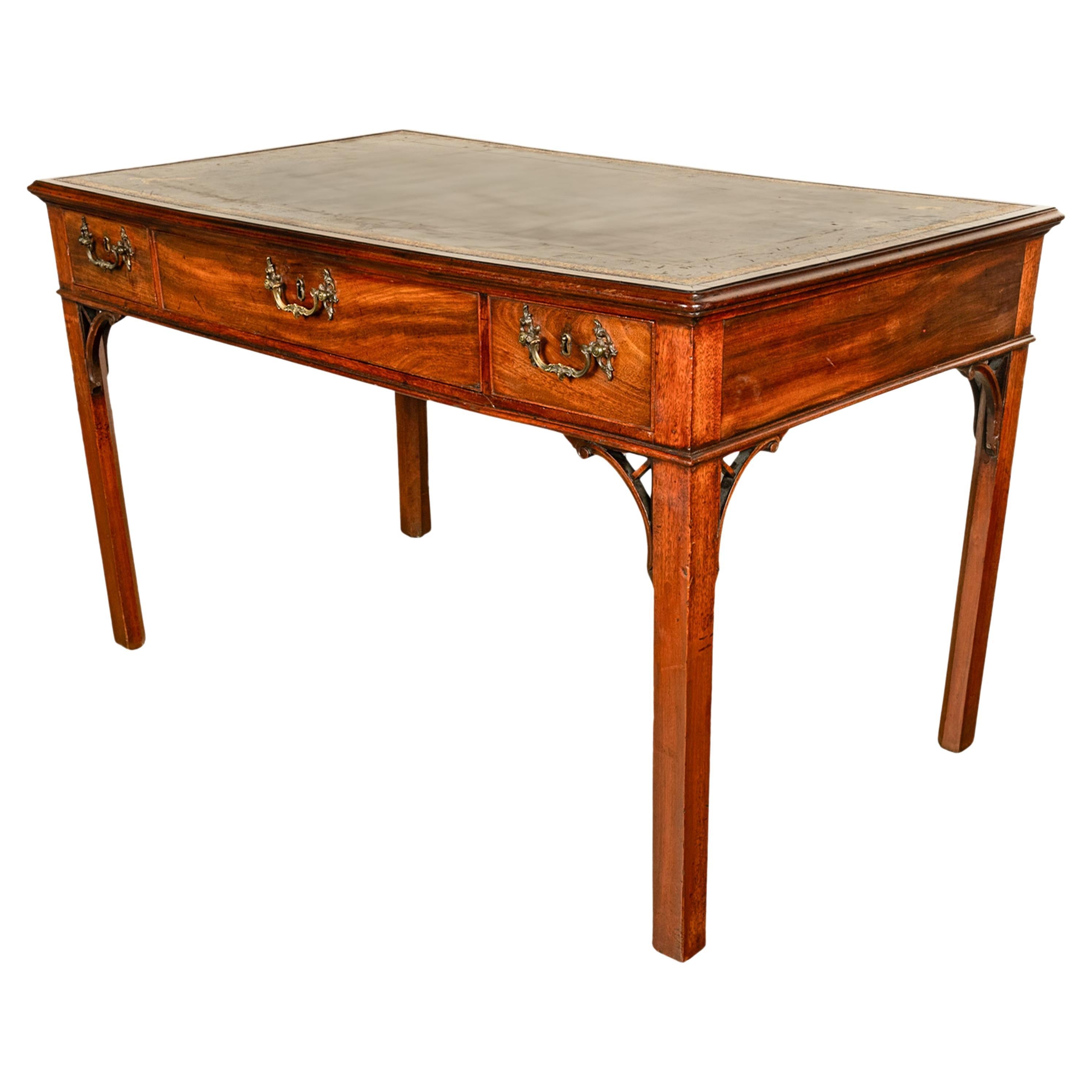 A good antique Georgian Regency mahogany library table partner's desk, circa 1820.
The desk is made from the finest solid figured flame mahogany and is fitted with a tooled and gilded brown leather writing surface, the desk having three locking