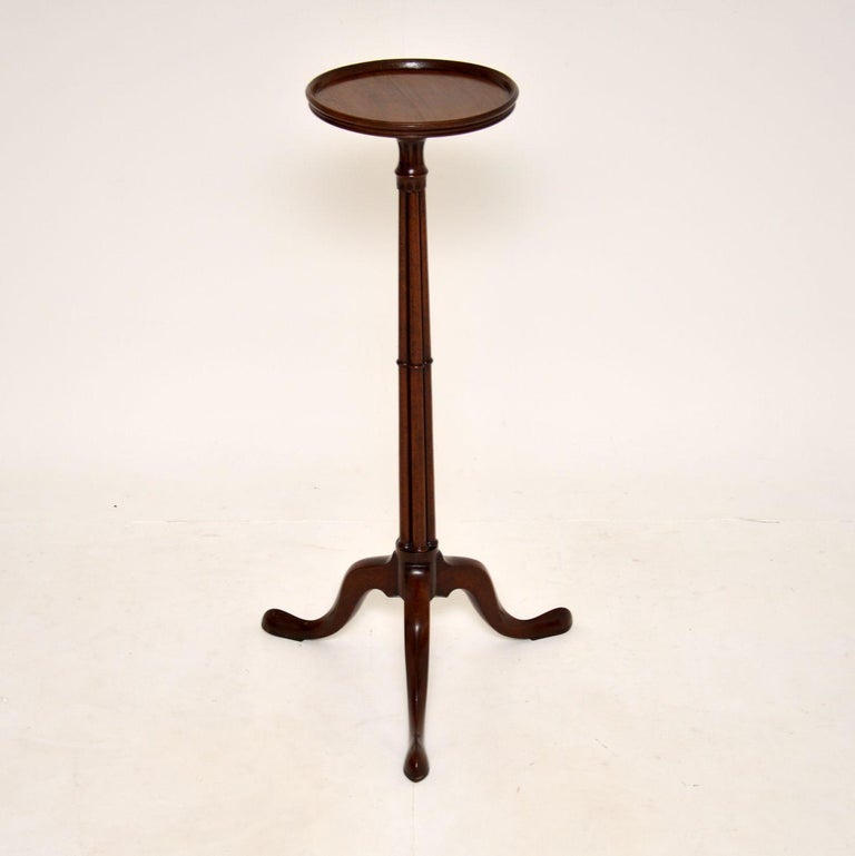 An excellent original Regency period side table. This was made in England & I would date it from around 1815-1830’s period.

This has a wonderful design, the tall main central column is actually divided into four narrow columns, terminating in a