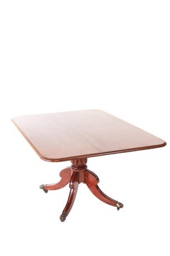Antico tavolo da pranzo con piano inclinabile in mogano Regency