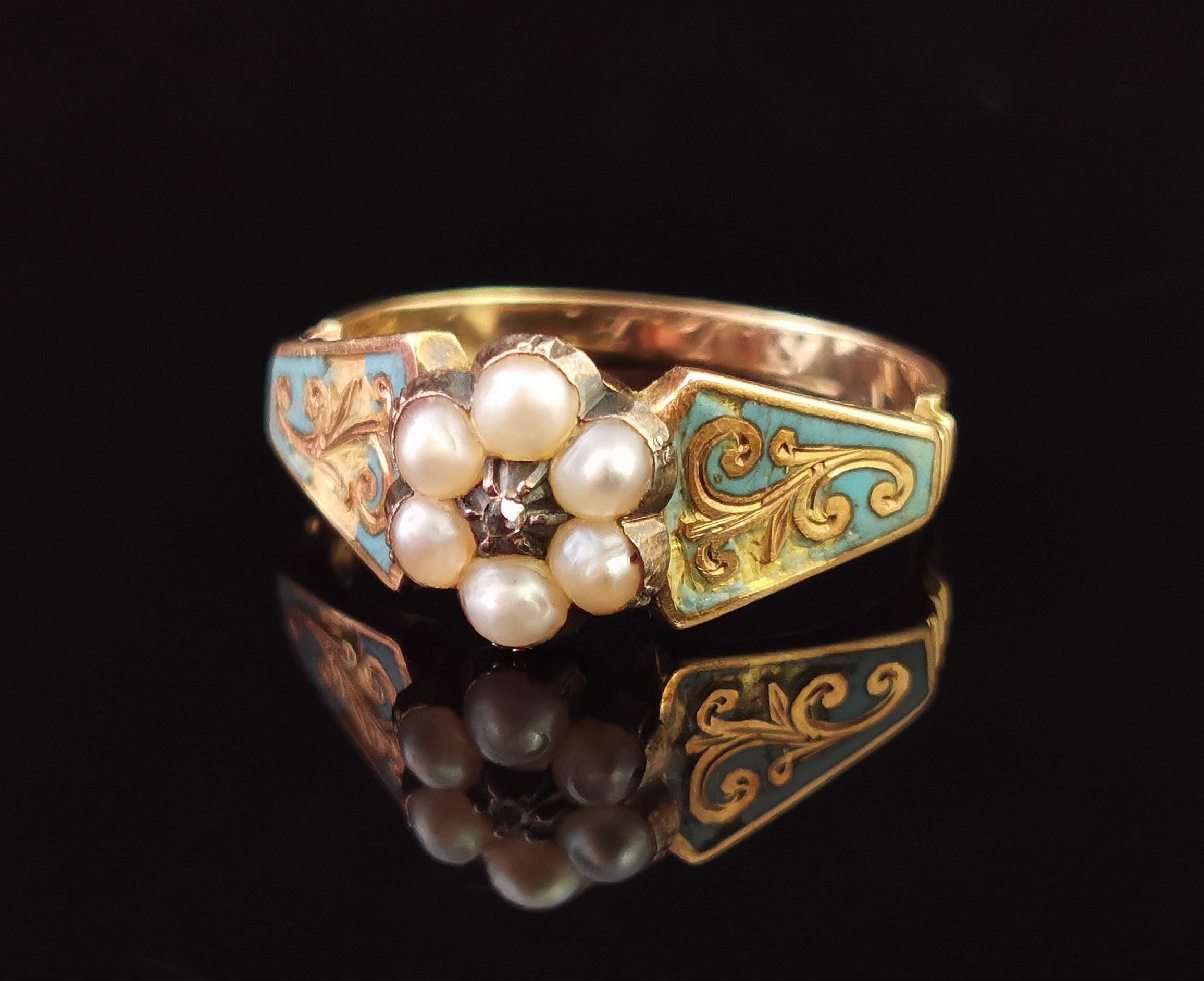 An absolutely stunning antique, late Regency era, forget me not mourning ring.

Buttery rich 18 karat yellow gold with decorative engraved stepped shoulders highlighted with a light sky blue enamel and a tapering bevelled band.

To the centre there