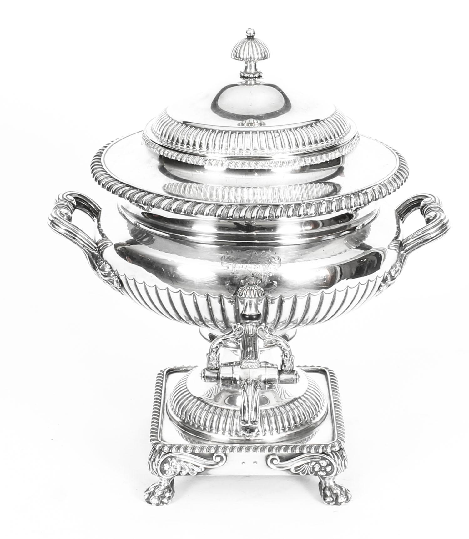 This is a wonderful antique Regency Old Sheffield silver plated tea urn, circa 1820 in date.

This handsome antique Old Sheffield silver plated samovar has a reeded finial, foliate handles and tap finial. Typical decoration of the period with half