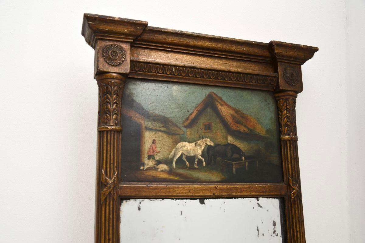 Ein schöner und sehr gut gemachter antiker Regency-Spiegel aus vergoldetem Holz. Sie wurde in England hergestellt und stammt aus der Zeit zwischen 1800 und 1820.

Er ist von schöner Qualität und hat eine sehr nützliche Größe. Das vergoldete Holz hat