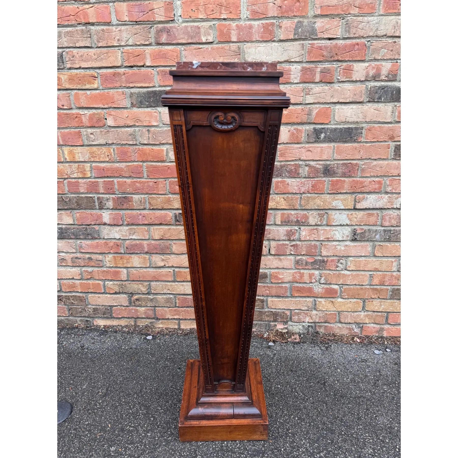 This is a Regency Mahogany and Marble Pedestal with applied panels on a shaped plinth with pedestal base. A versatile piece of furniture that can serve multiple purposes in space planning your home. 

Dimensions
11ʺW × 11ʺD × 43ʺH
