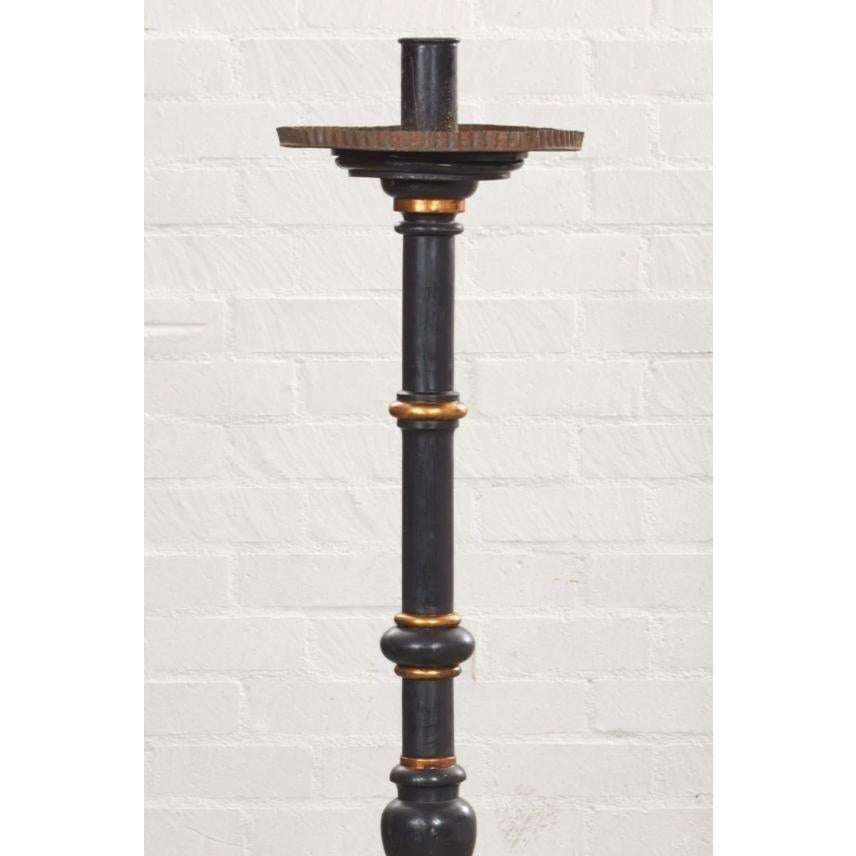 Antique Regency period ebony & giltwood torchere floor candlestick. It features a classic regency form with Giltwood trim and dates to the second quarter of the 19th century
Priced each.

Additional information:
Materials: Ebony,