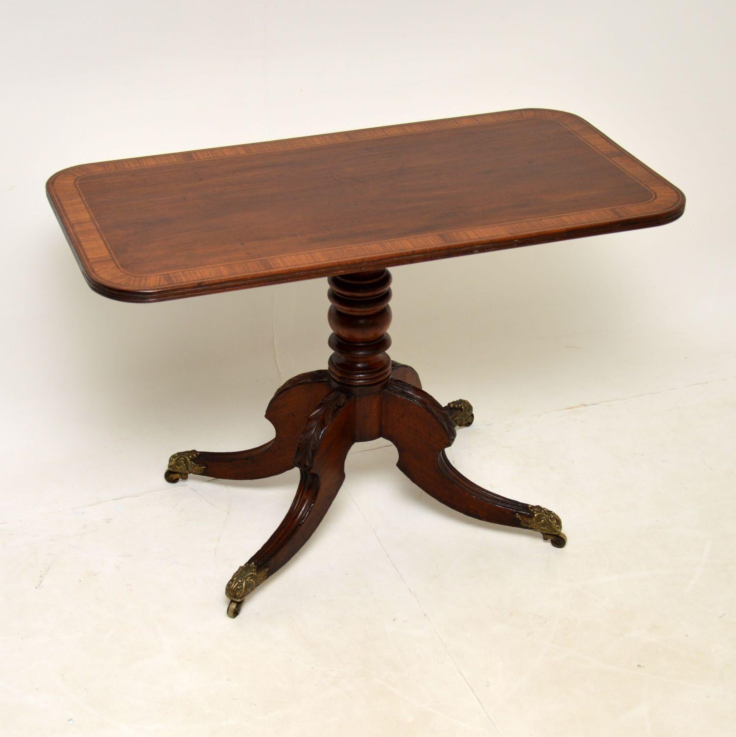 A stunning and very rare English Regency period occasional or side table in Mahogany, dating from around the 1800-1820 period.

Beautifully made from solid mahogany and cross banded satin wood, this is of extremely fine quality. The brass feet