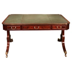 Antique Regency period mahogany end support writing table