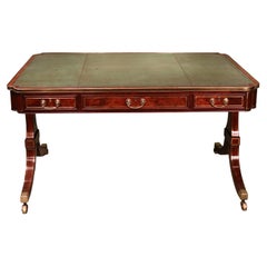 Antique Regency period mahogany end support writing table