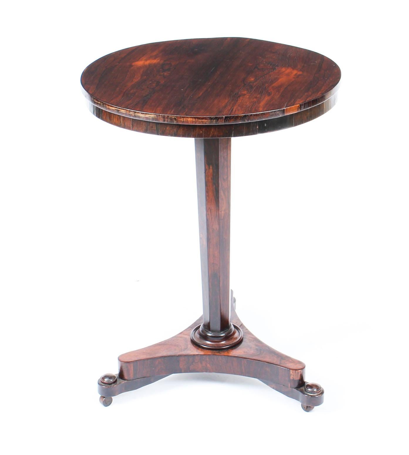 This elegantly proportioned antique Regency Period occasional table is circa 1820 in date.

This table has been masterfully crafted in Gonçalo Alves with a circular top on an octagonal tapering column with a triform base.

There is no mistaking