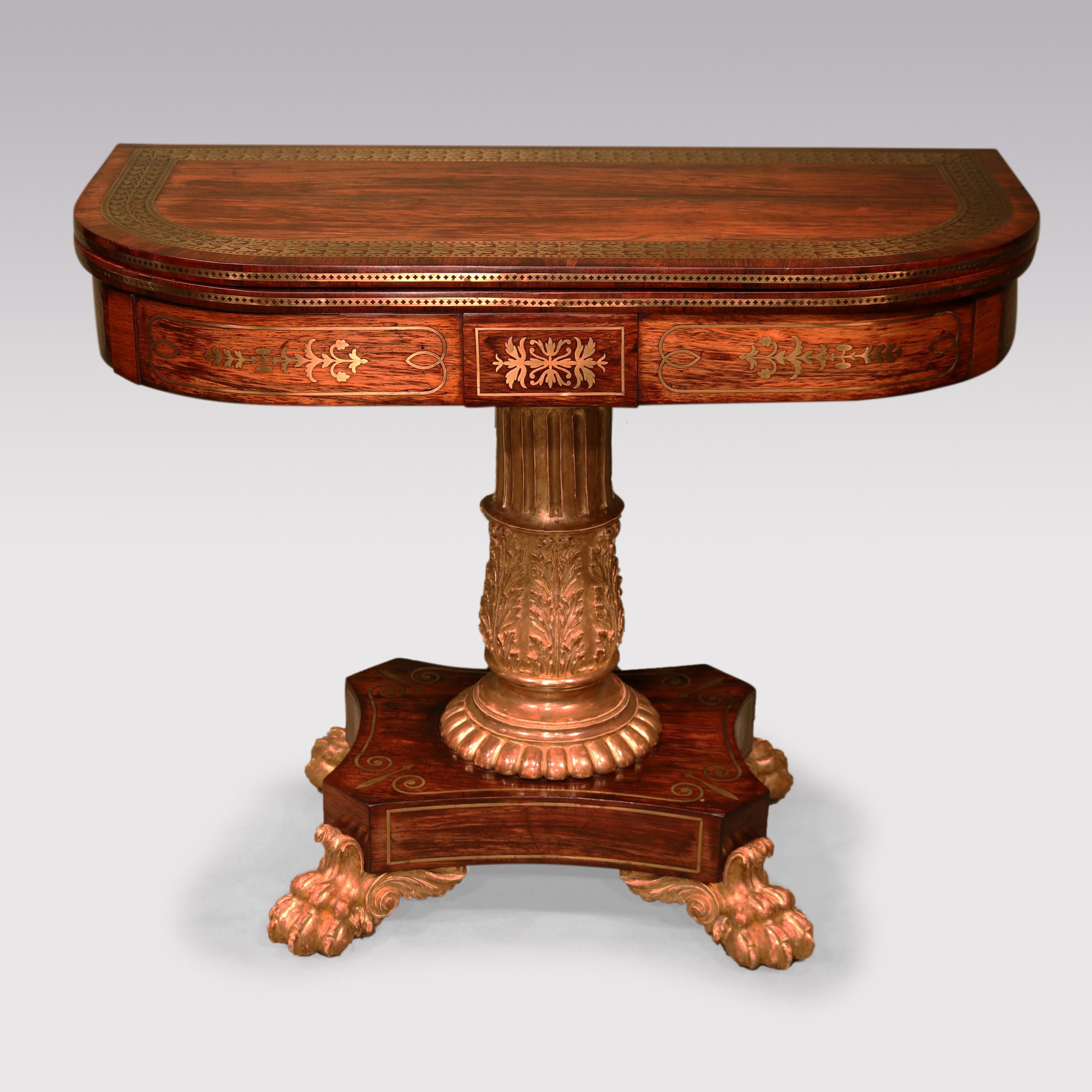 A rare late Regency period rosewood D-shaped Card Table having extremely fine brass inlay to interior, exterior and frieze, supported on fluted & acanthus carved centre pedestal raised on concave platform base ending on carved lion’s paw feet.