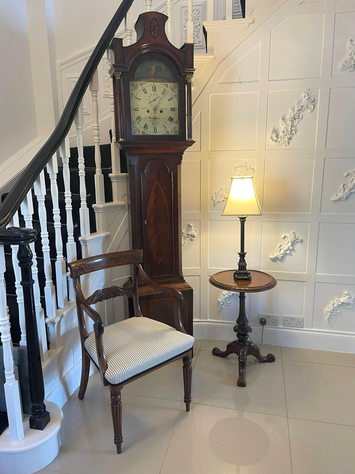 Antique Regency quality carved mahogany desk chair having a quality shaped carved top rail, carved mahogany shaped splat to the centre, scroll shaped open arms, newly reupholstered seats in a quality fabric standing on reeded turned tapering legs to