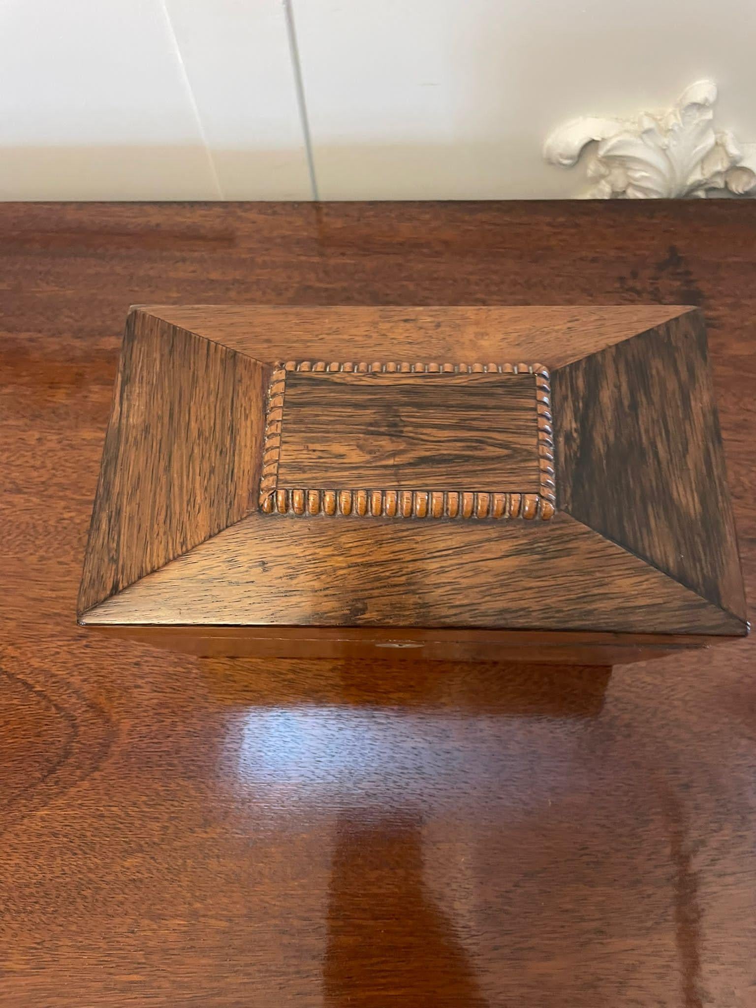 Antique Regency quality rosewood tea caddy having a quality carved rosewood lift up top opening to reveal two lidded tea compartments, original escutcheon


A quaint piece displaying a lovely colour


Dimensions:
Height 12.5 cm
Width 20 cm
Depth 12