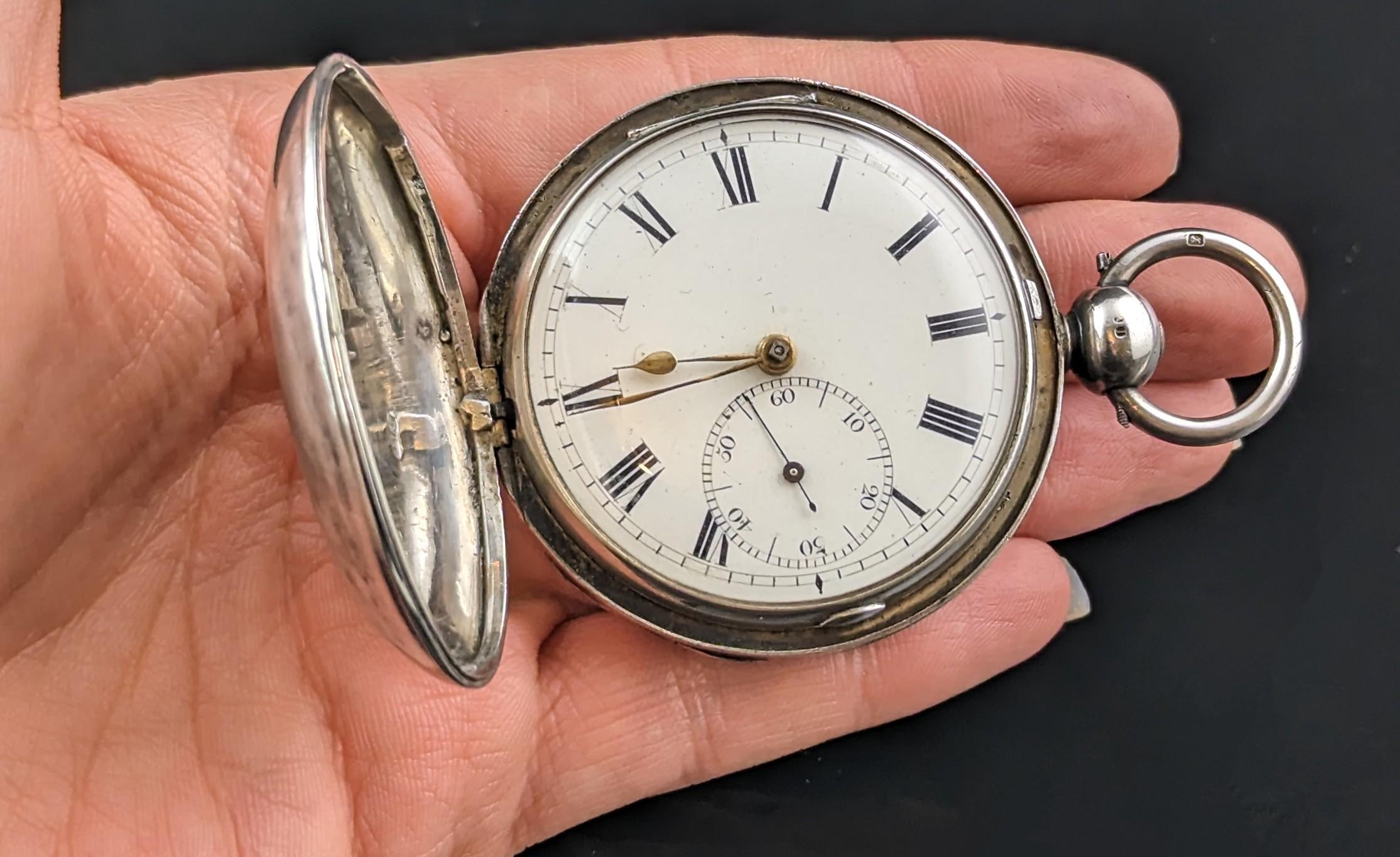A magnificent Regency era sterling silver full hunter pocket watch.

It is large substantial pocket watch with a heavy silver full hunter case, fully hallmarked.

It has a white dial with black Roman numerals and gilt hands with a subsidiary second