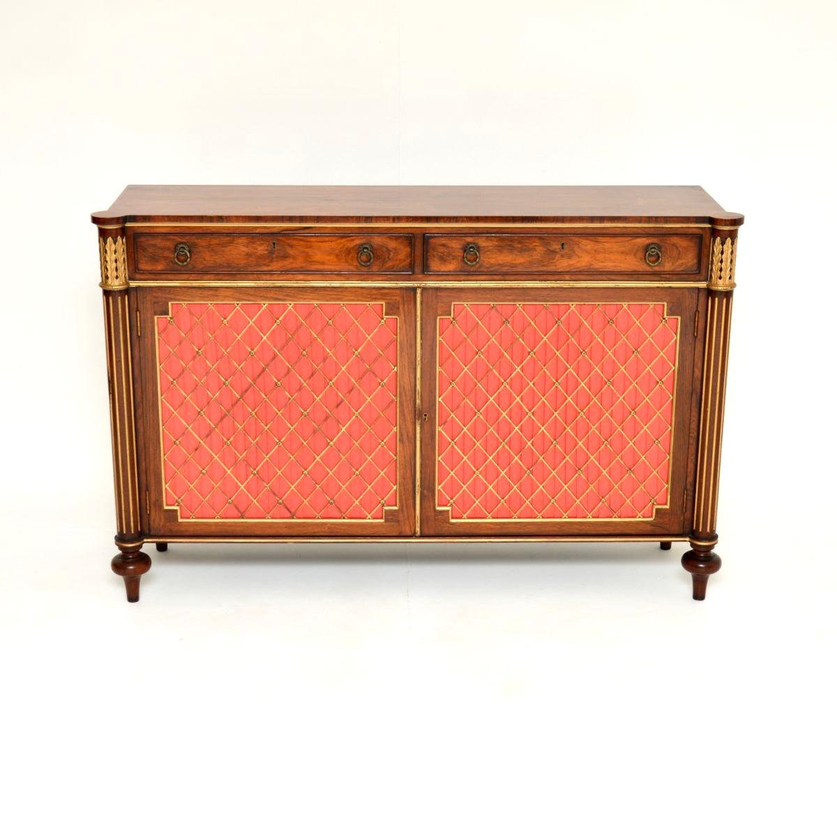 A stunning antique Regency Style grill front sideboard. This was made in England, it dates from around the 1930-50’s.

The quality is outstanding, this is beautifully designed and is a very useful size. The grain patterns are gorgeous, this has