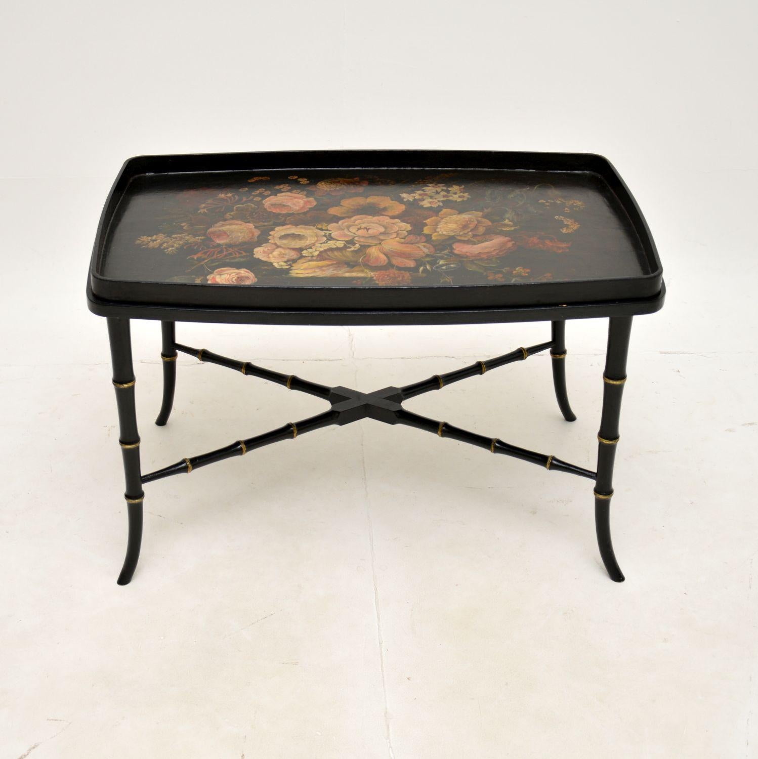 A stunning antique Regency style lacquered tray top coffee table. This was made in England, it dates from around the 1950-60’s.

The quality is superb, this is beautifully made and is a very useful size. The top lifts right off the base to be used