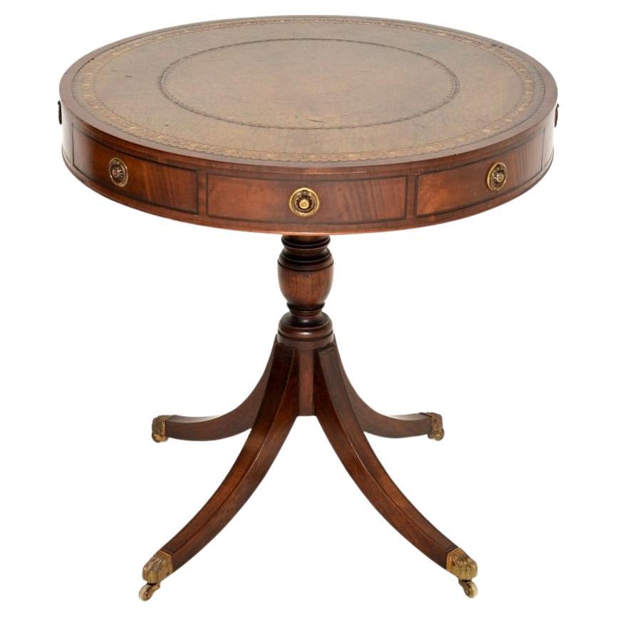 A lovely antique Regency style leather top drum table, dating from around the 1890-1910 period.

The quality is superb, this is really well made and has a gorgeous design. There is a beautiful tooled leather top, which has a wonderful colour and
