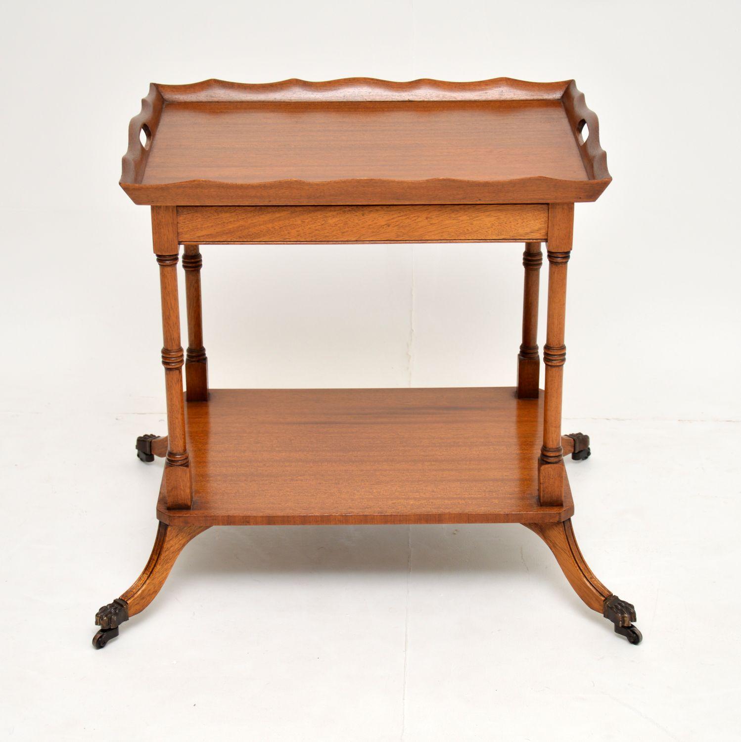 Antique Regency style mahogany tray top side table or trolley in excellent condition and dating from circa 1930s period.

This is a very useful piece, because the tray top can be lifted off for serving food or drinks on. Underneath the tray is a